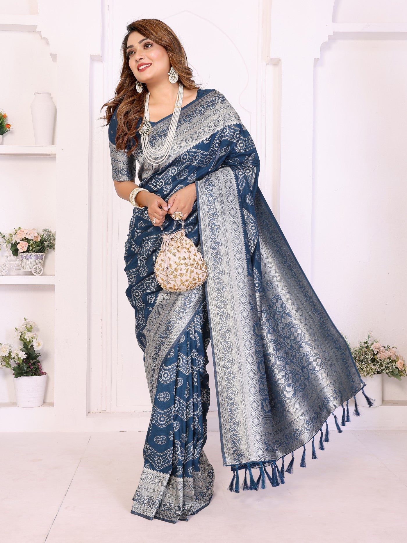 Teal Blue Georgette Silk Saree With Leheriya And Elegant Zari Weaving