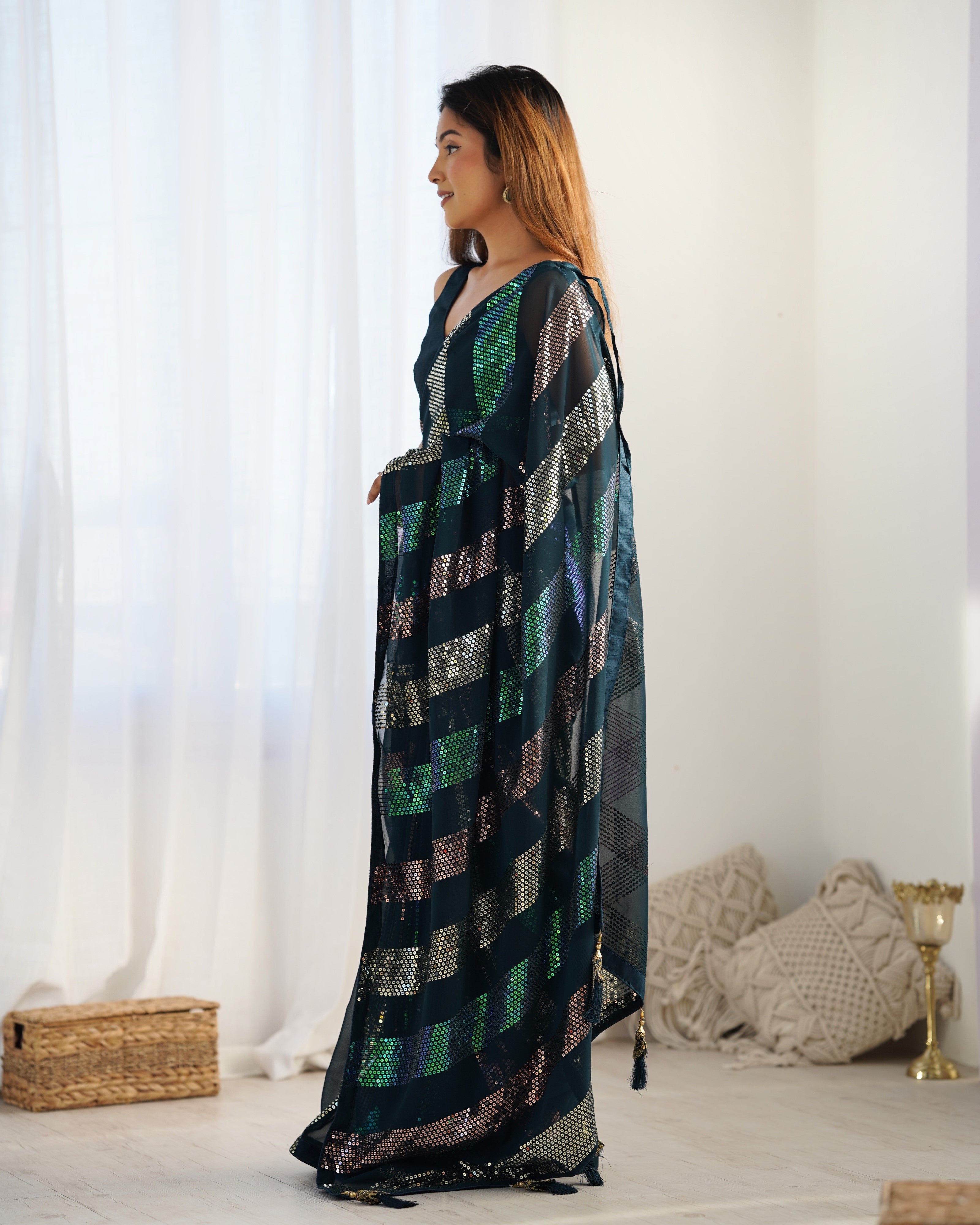 Teal Blue Glamorous Georgette Fabric Sequins Work Bollywood Looks Saree