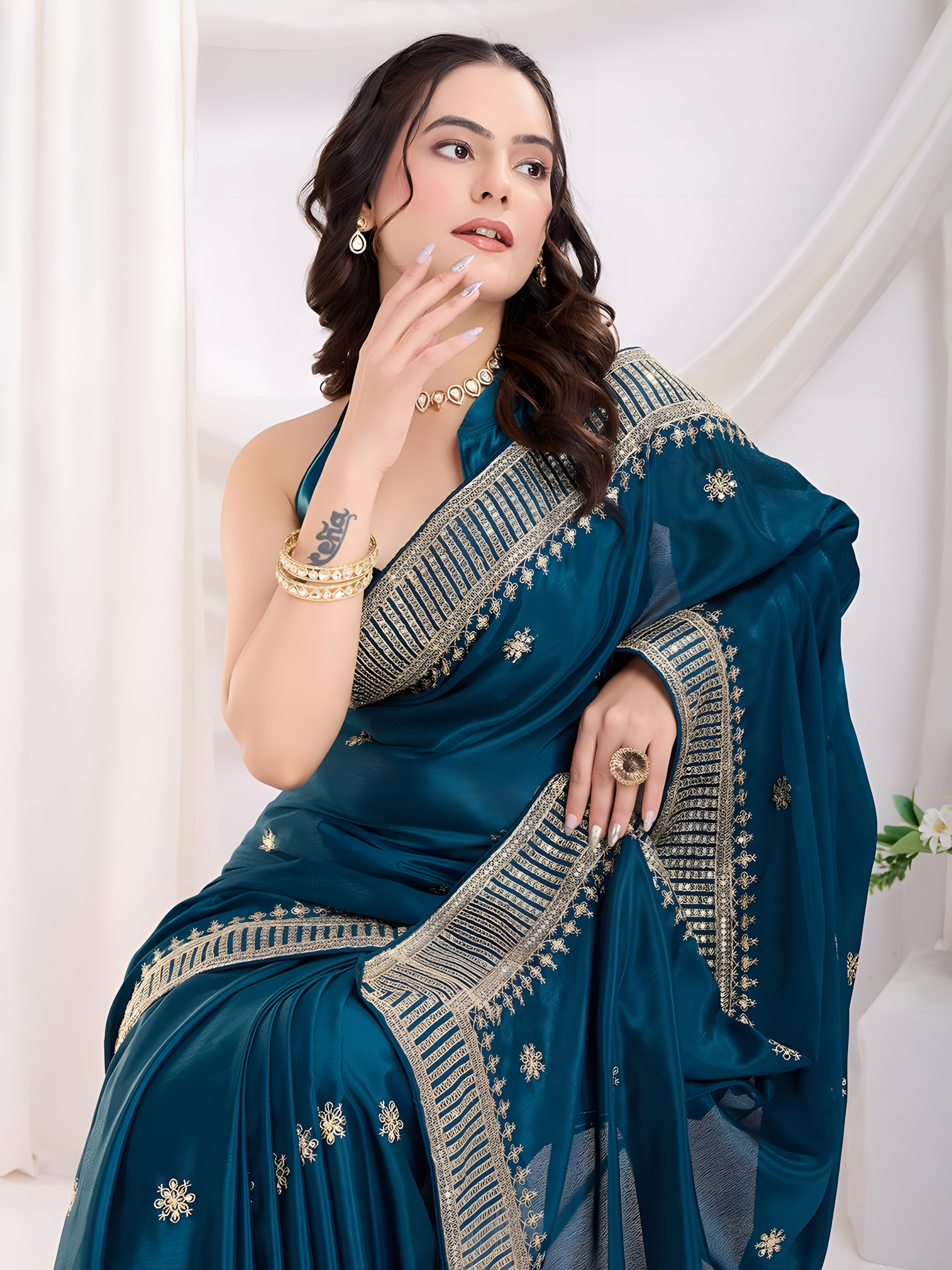 Teal Chinon Silk Saree with Cbpallu all Over Embroidery and Sequins Work