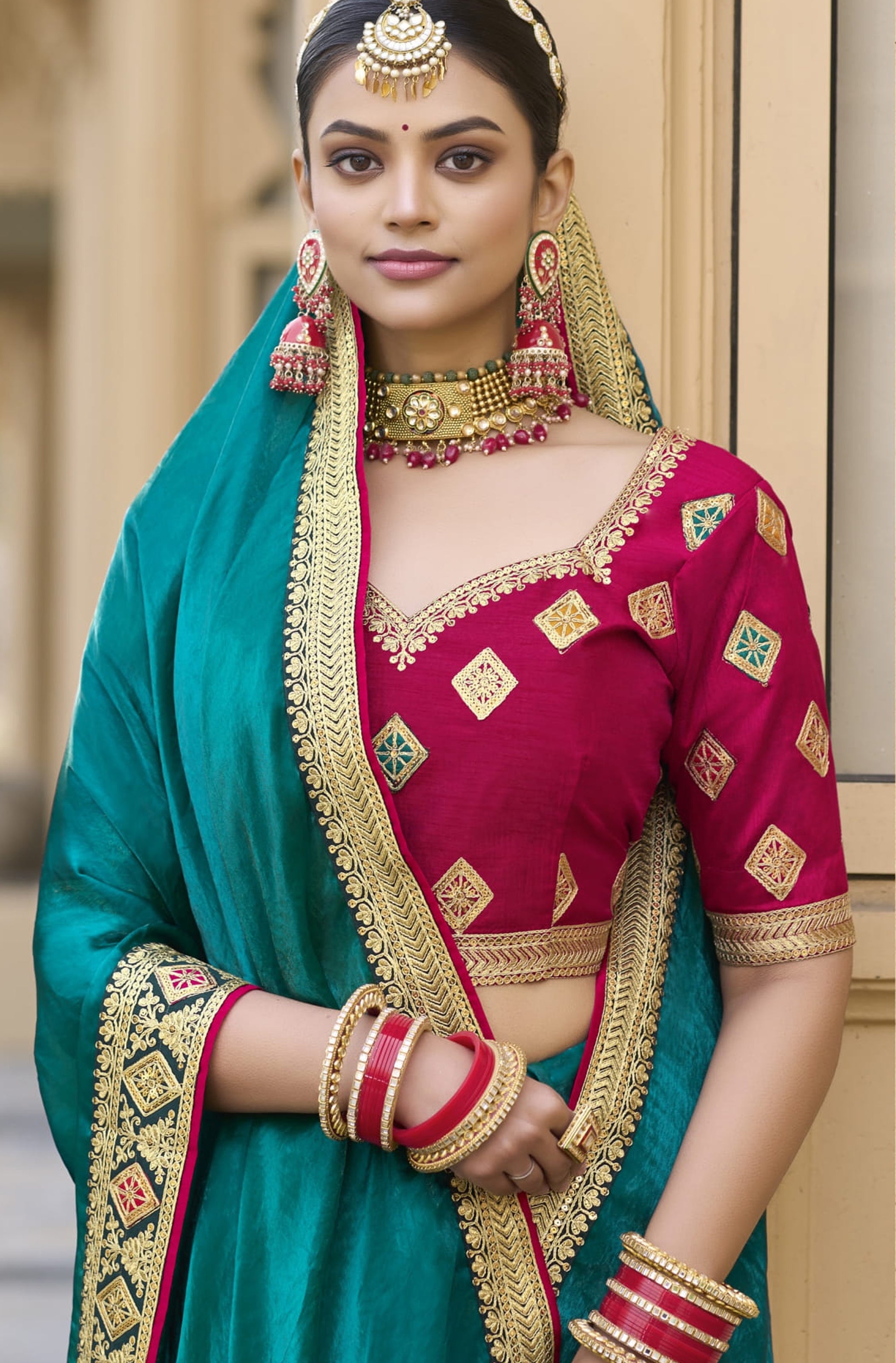 Teal Georgette Plain Saree With Embroidered Lace Border