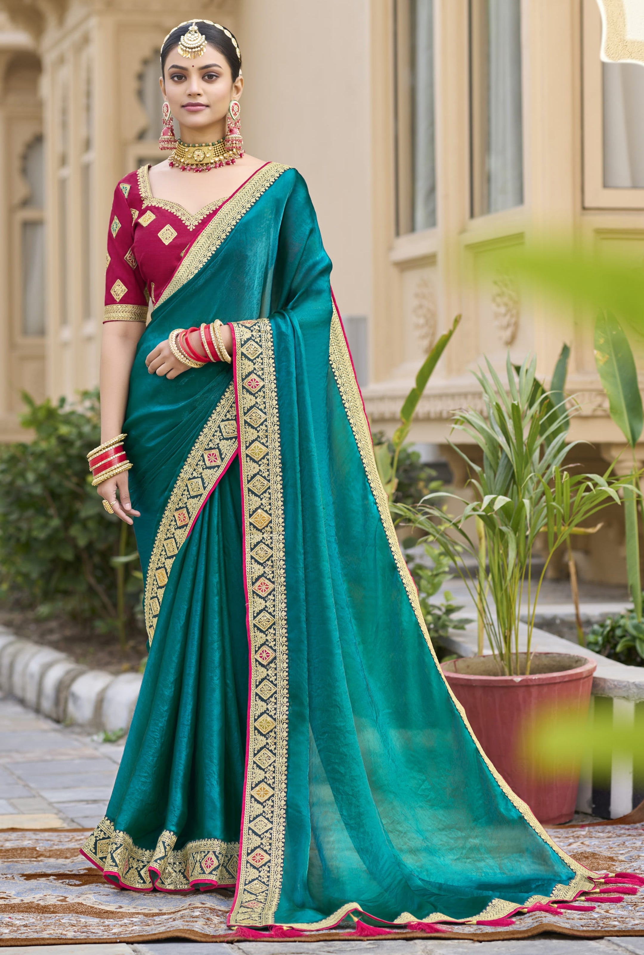 Teal Georgette Plain Saree With Embroidered Lace Border