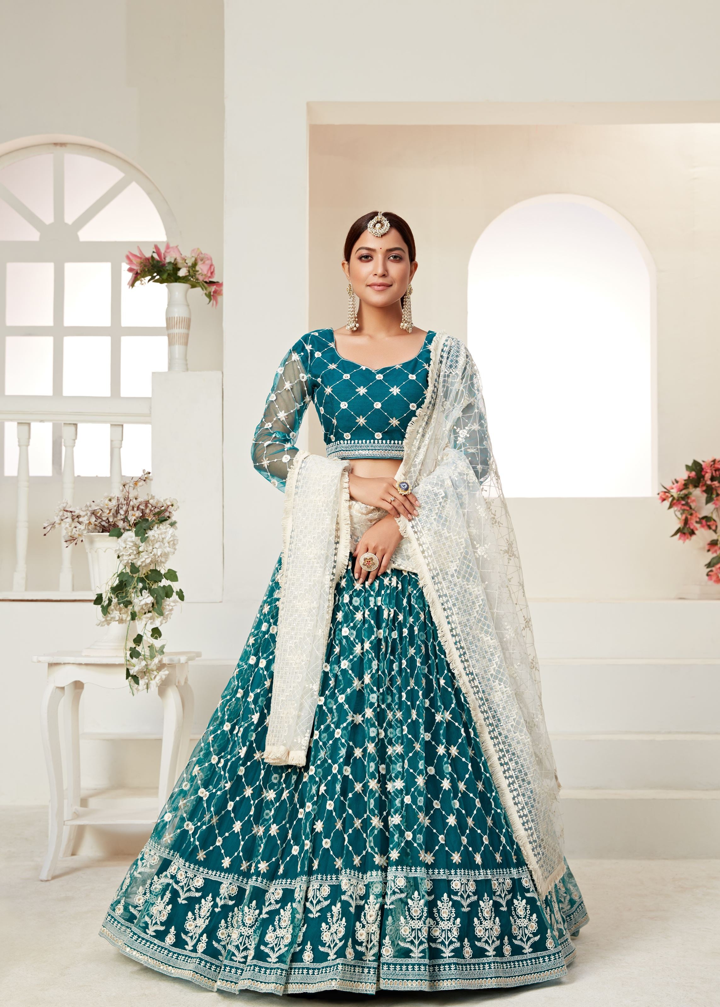 Teal Green Lehenga Choli And Dupatta With Multi Net And Sequence Embroidered Thread Work