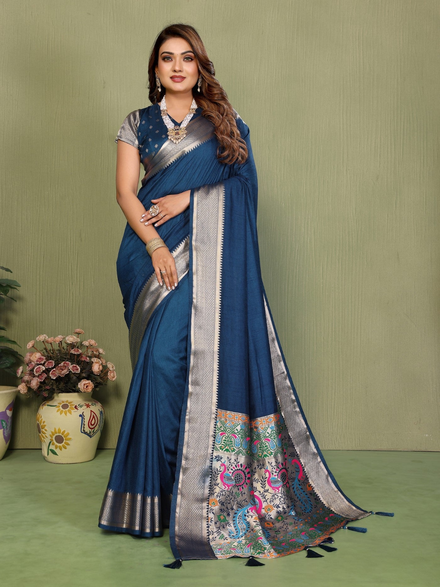 Teal Silk Saree With Elegant Weaving