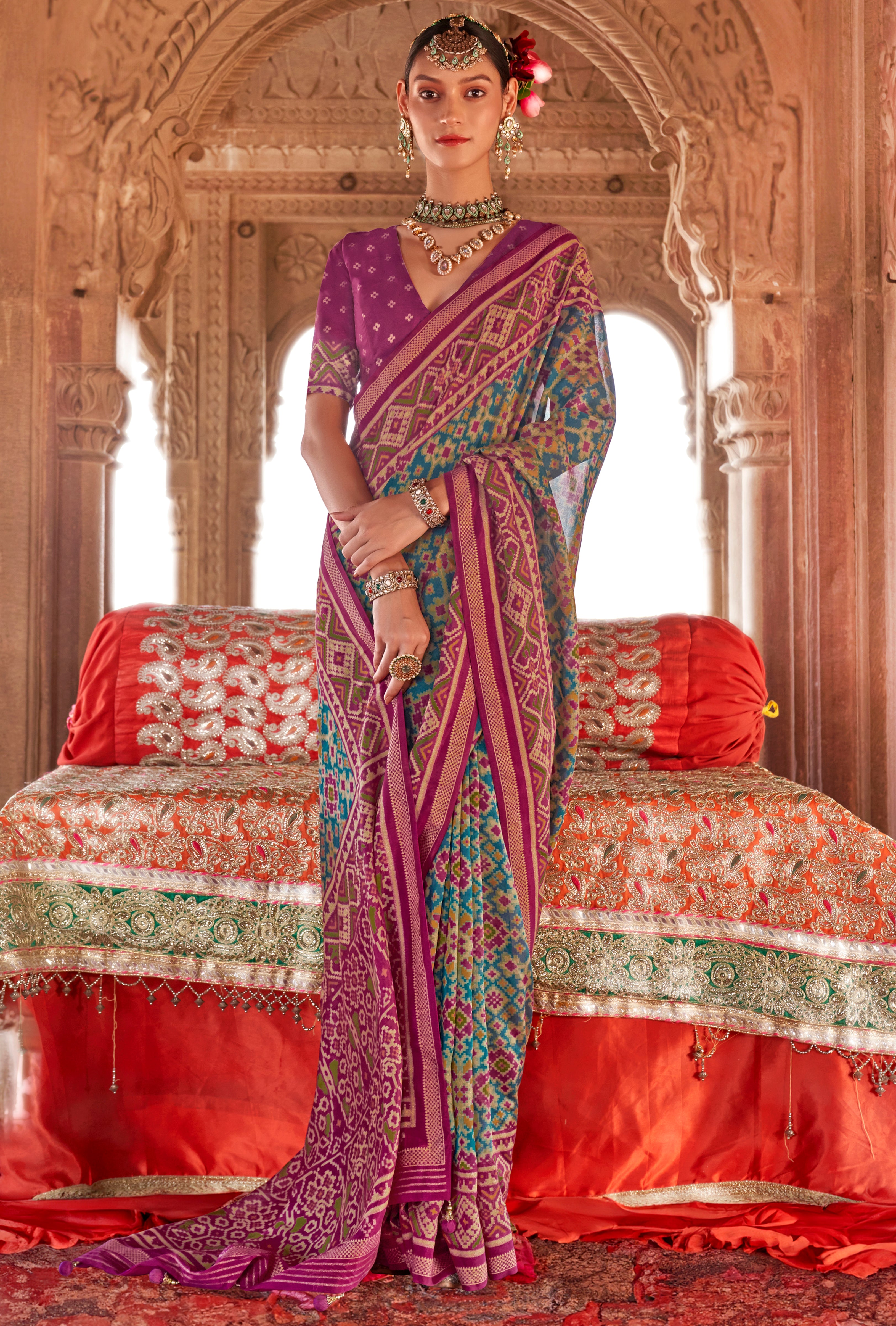 Teal Super Georgette Saree With Patola Print