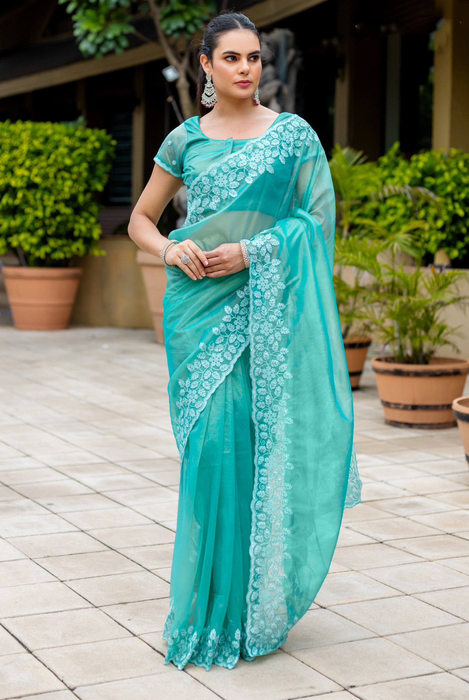 Turquoise Gold-Infused Twill Saree with Zari Sequins Cut Work