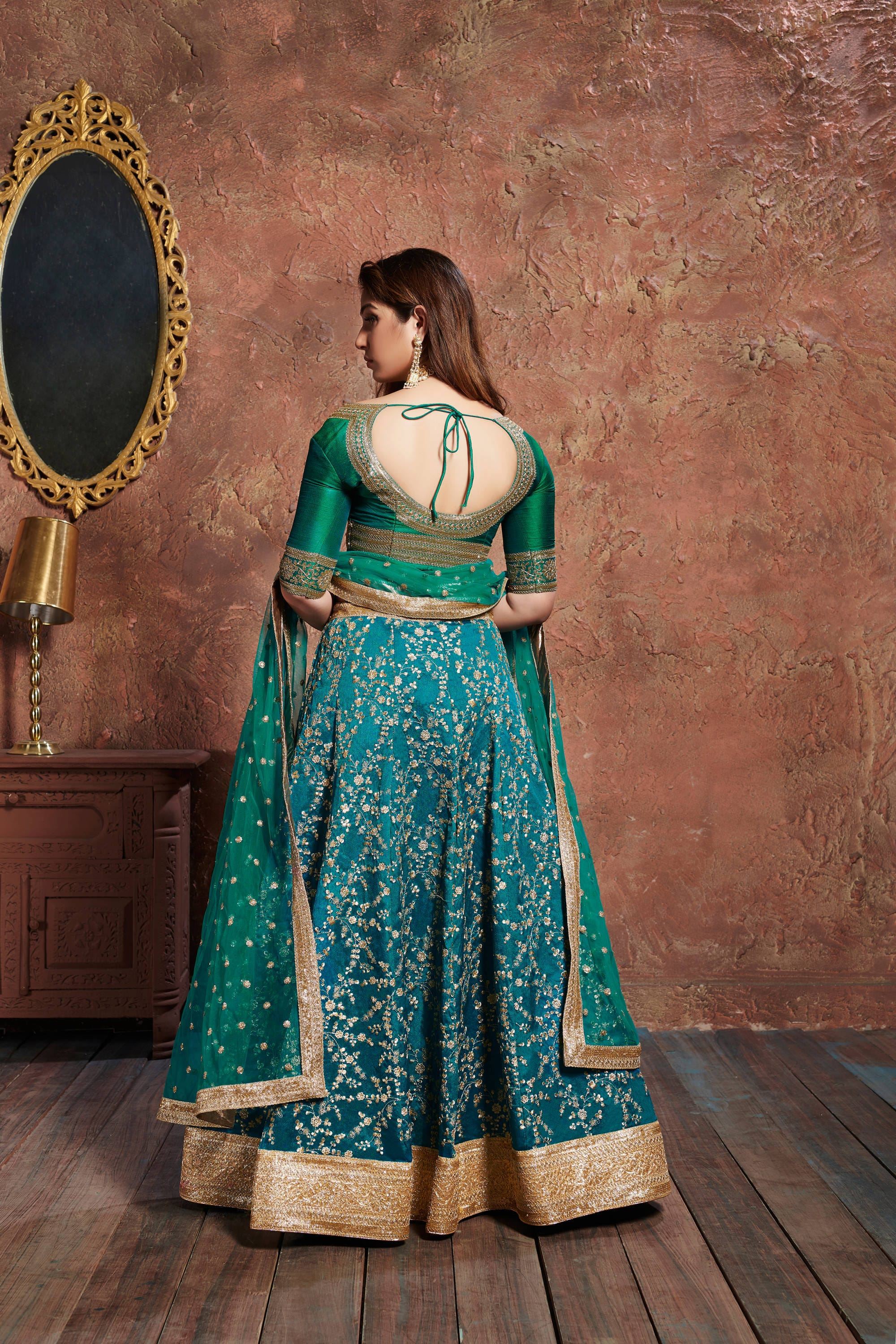 Turquoise Lehenga Choli With Zari, Sequins And Dori Embroidery