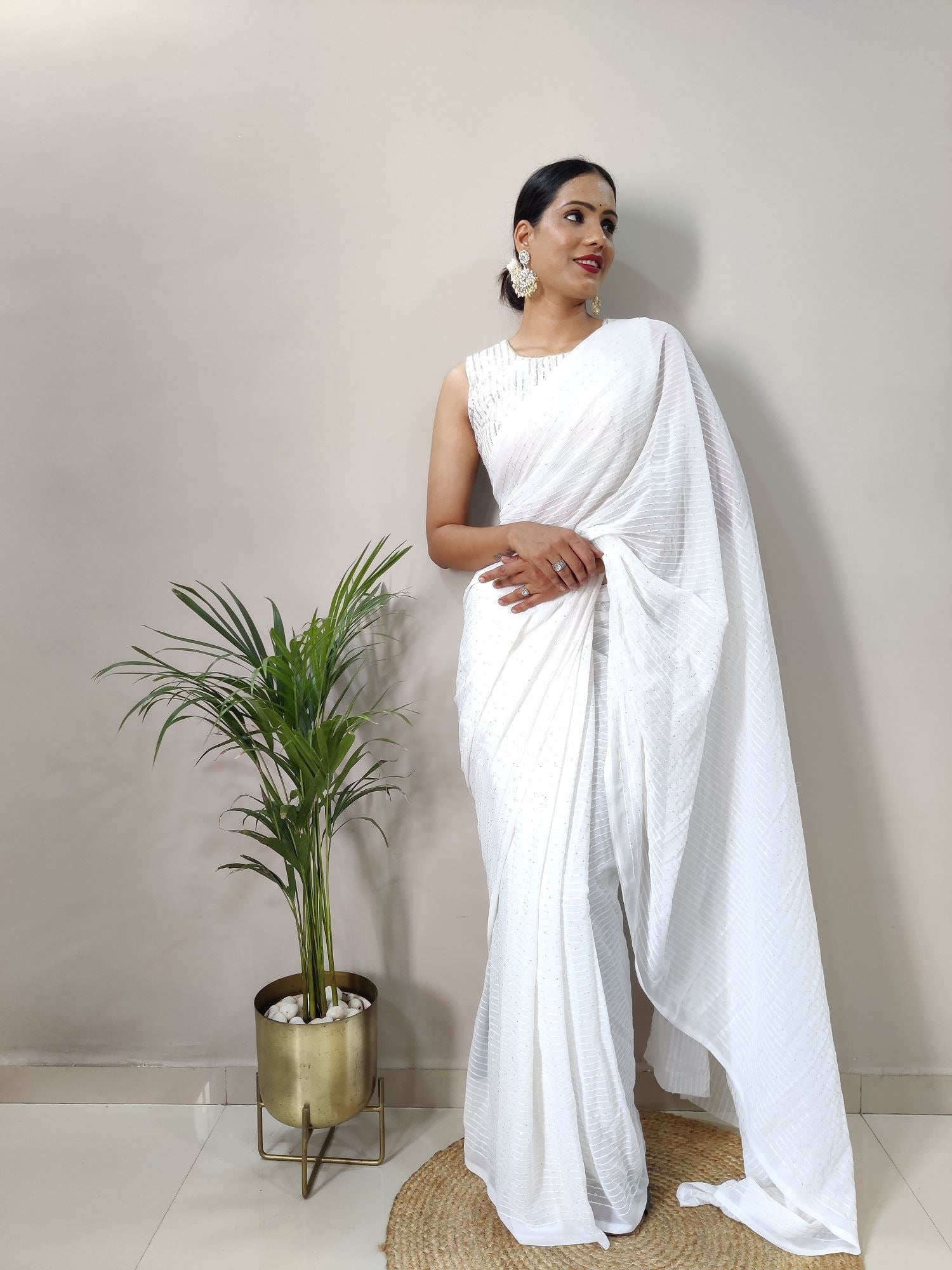 White Colour Georgette Fabric Heavy Work Saree
