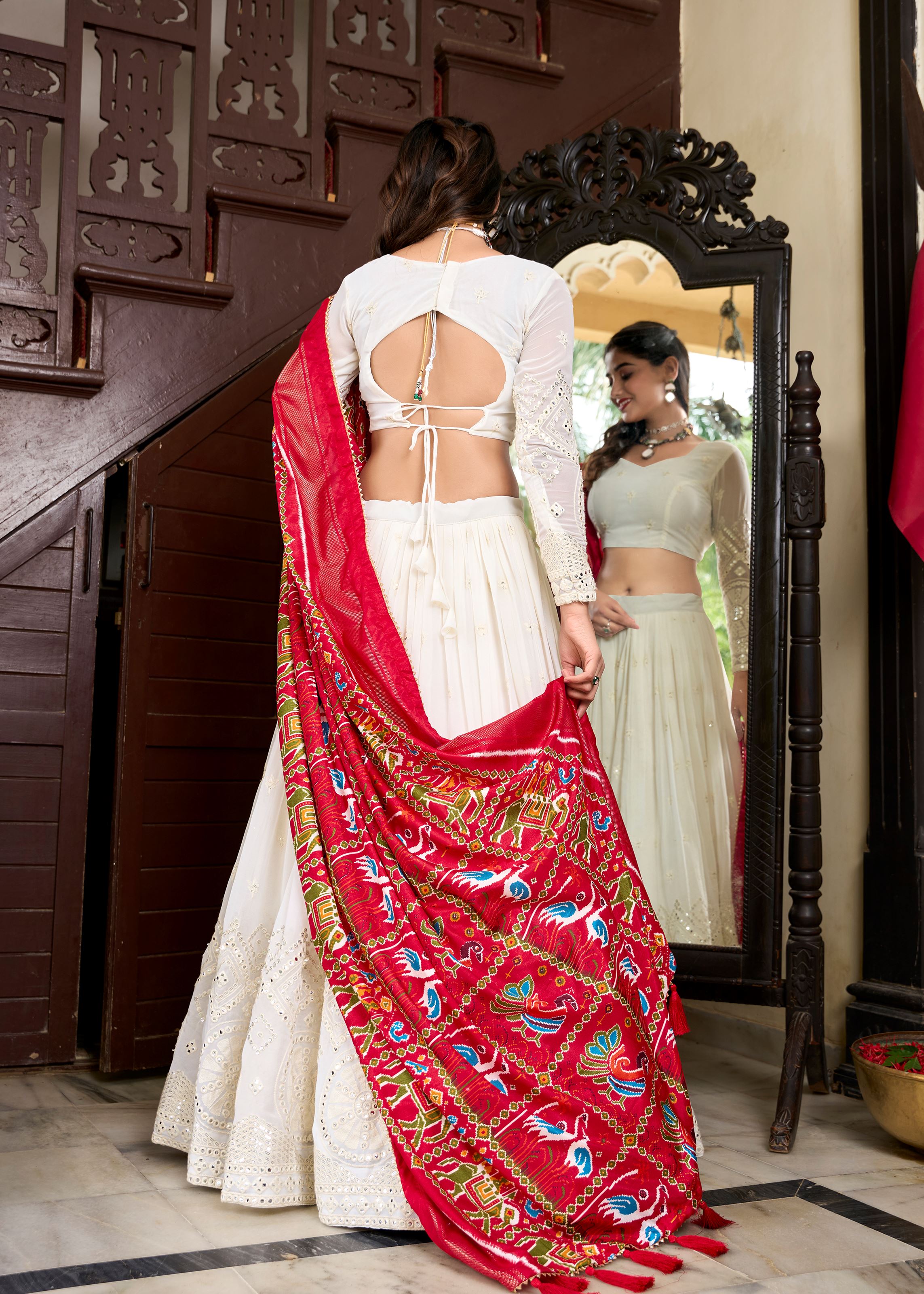 White Elegance Lucknowi Embroidered Lehenga with Subtle Mirror Highlights