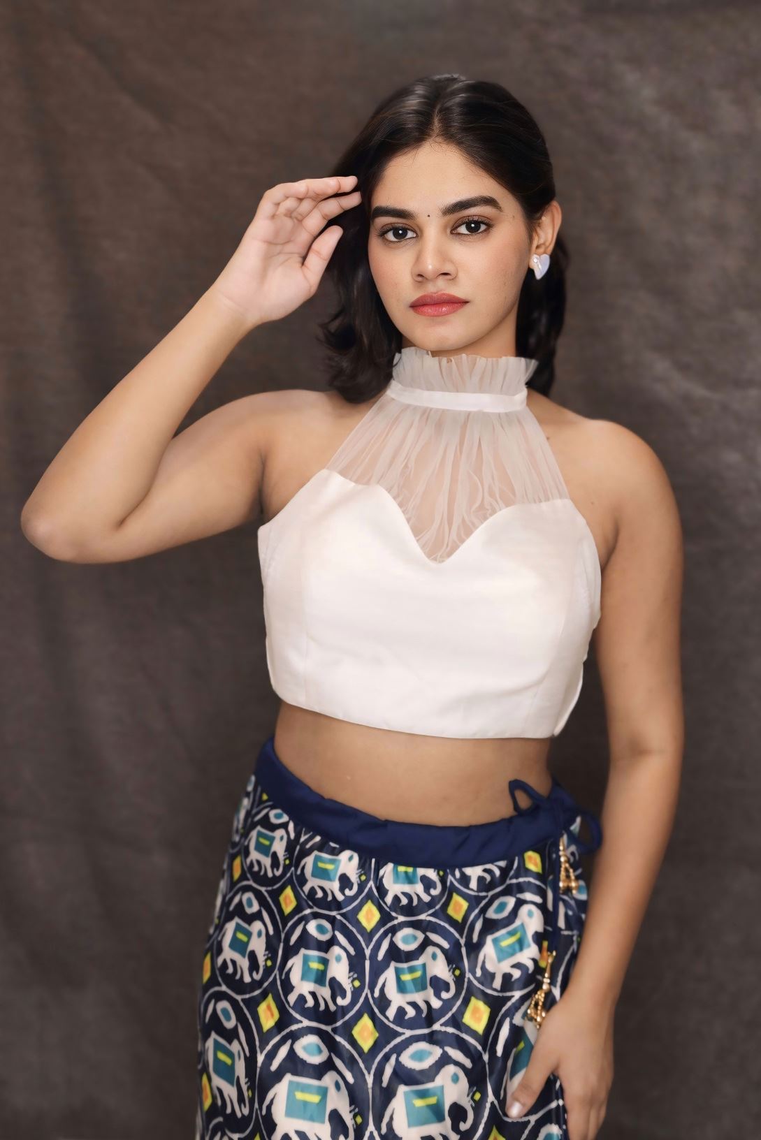 White Halter Neck Blouse with a sheer High Neckline and Sweetheart Shaped Bodice