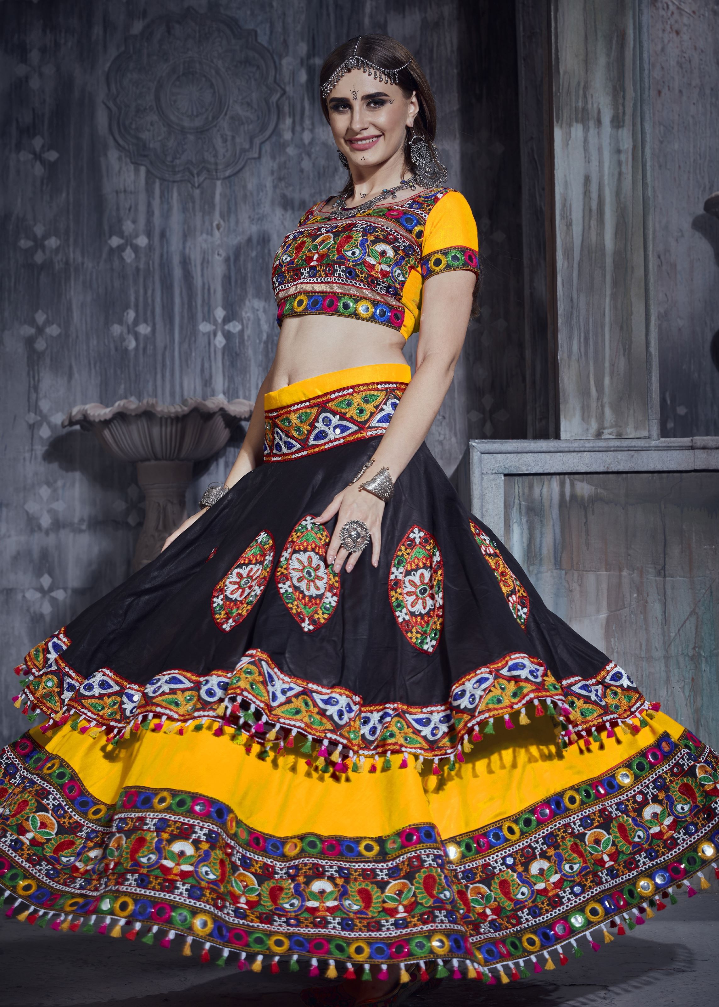 Yellow And Black Navratri Chaniya Choli With Gamthi Work And Lace Work With Mirror