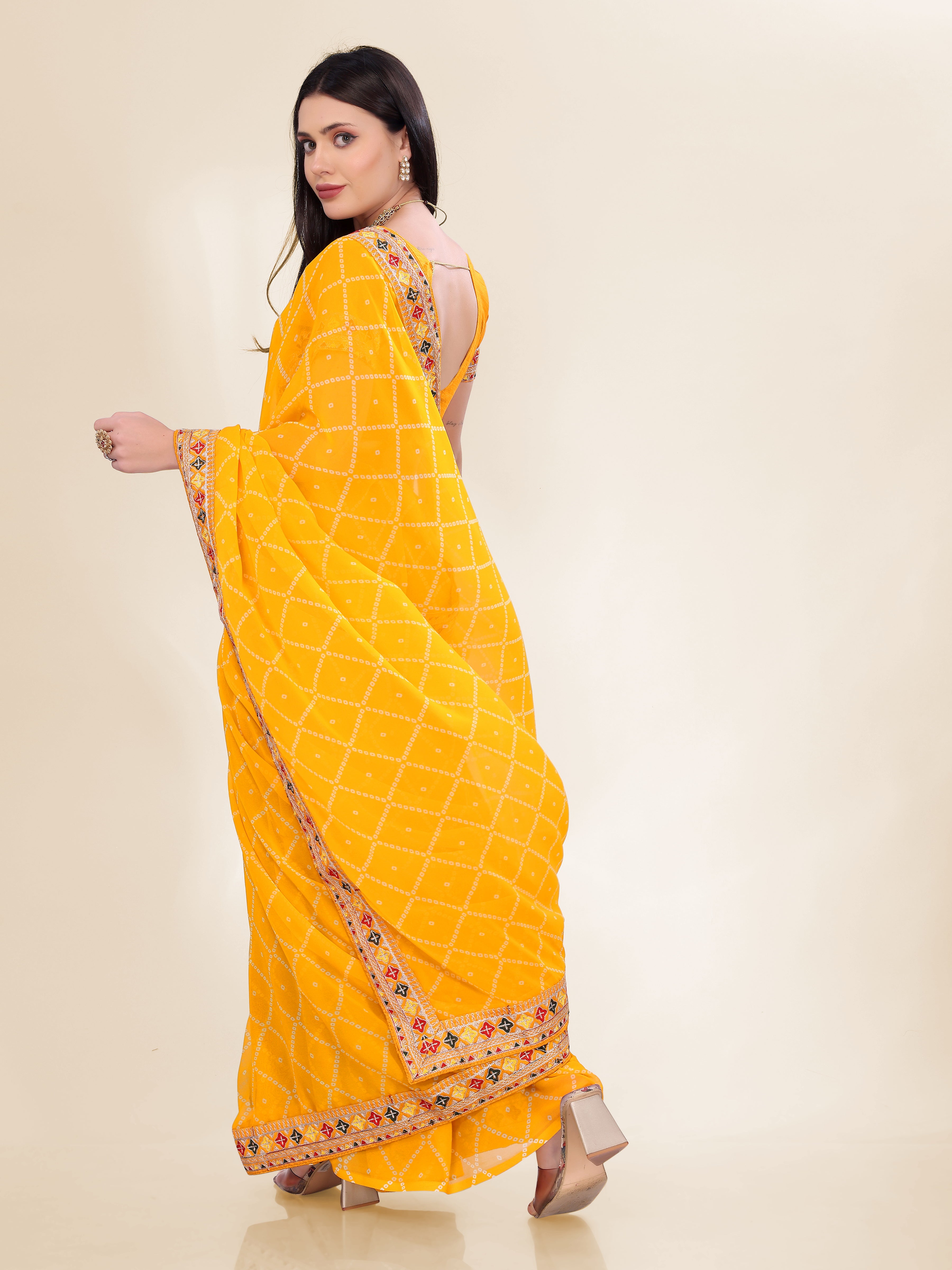 Yellow Georgette Bandhej Printed Saree With Graceful Embroidery Work