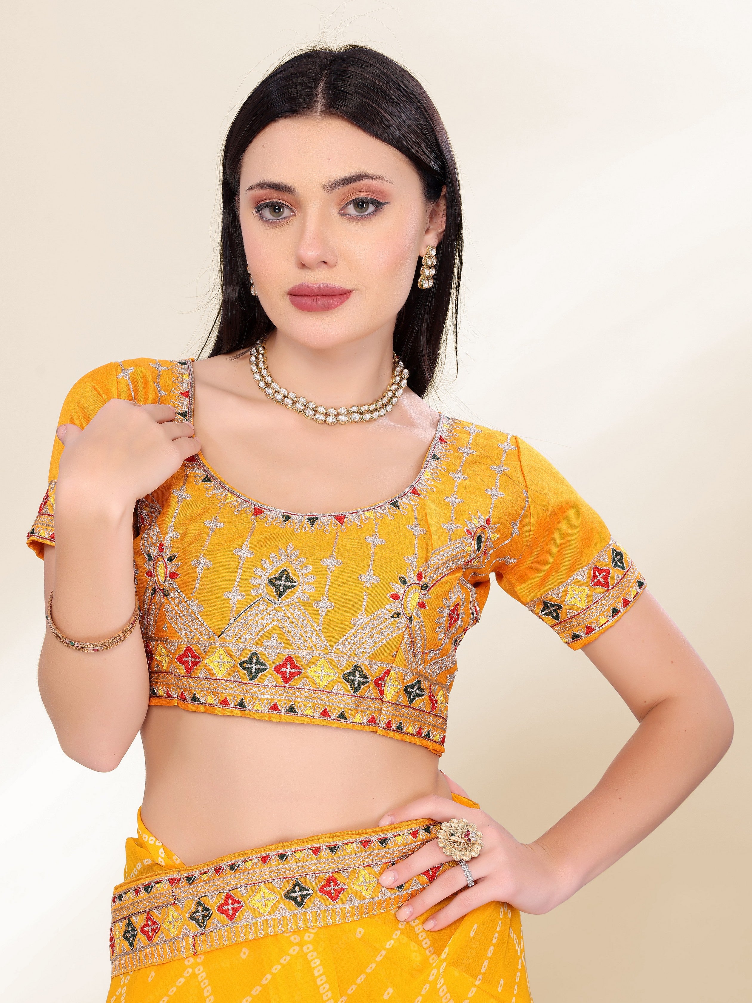 Yellow Georgette Bandhej Printed Saree With Graceful Embroidery Work