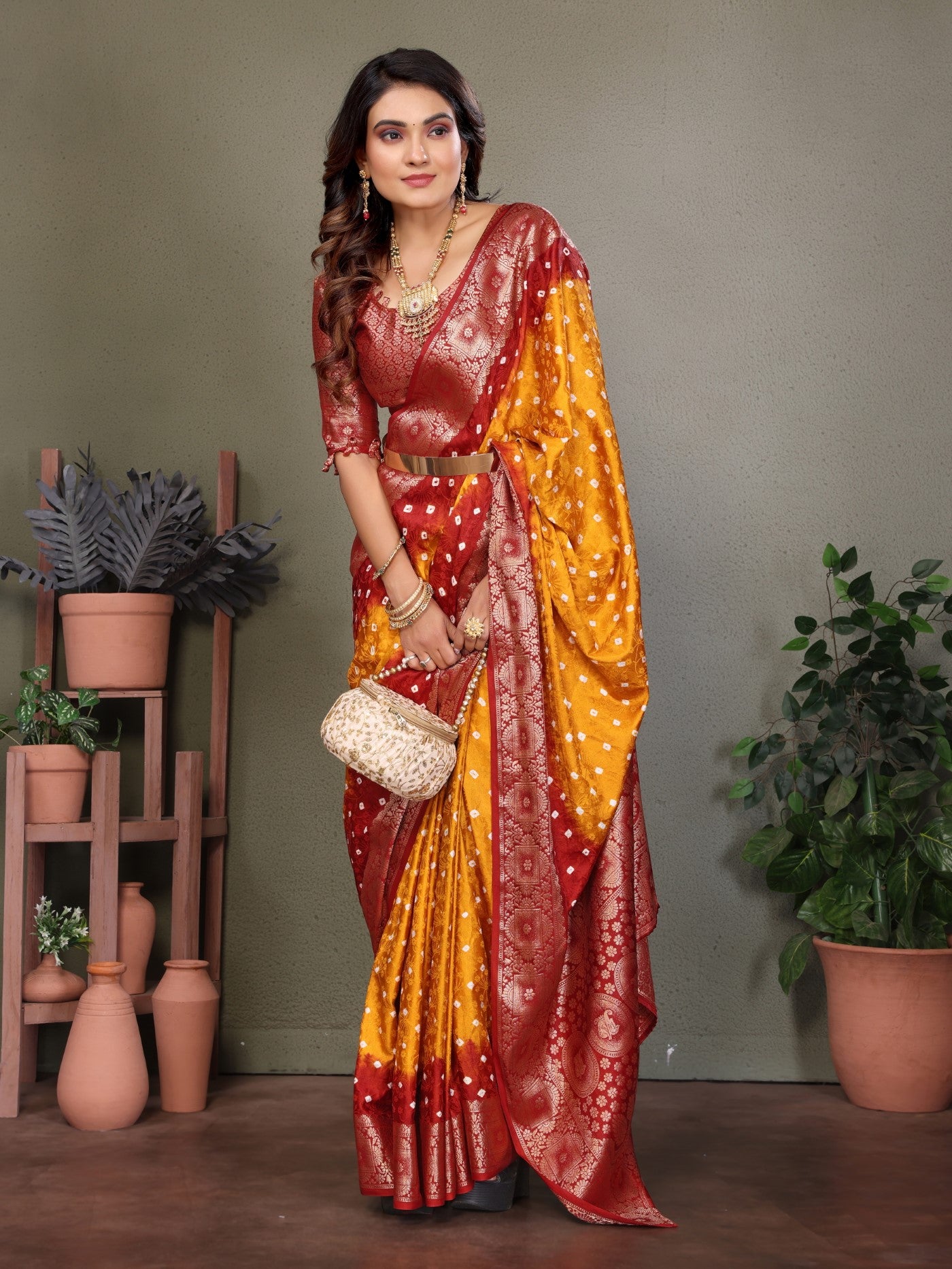 Yellow Satin Silk Saree With Bandhej And Zari Weaving