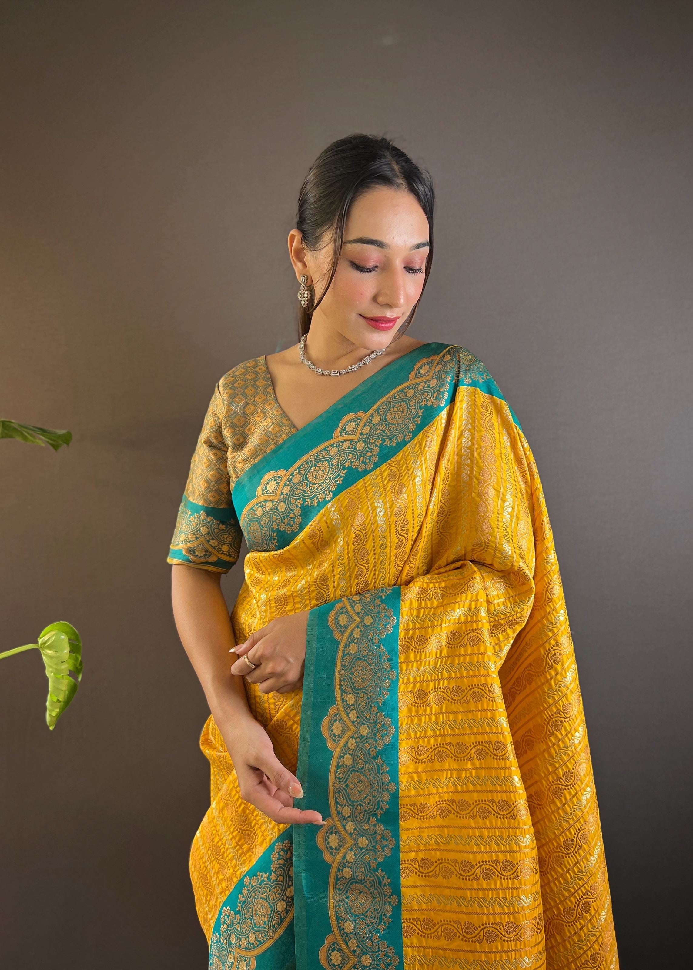 Yellow Silk Blend Saree With Zari and Woven Work
