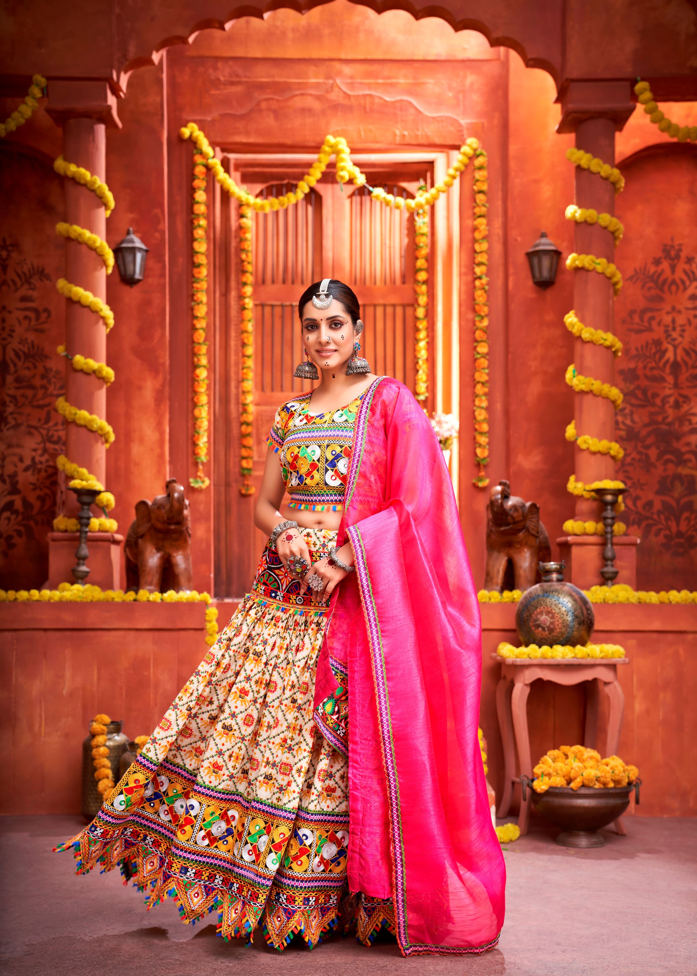 Cream And Pink Navratri Chaniya Choli With Gamthi Work And Pattola Print With Mirror Work