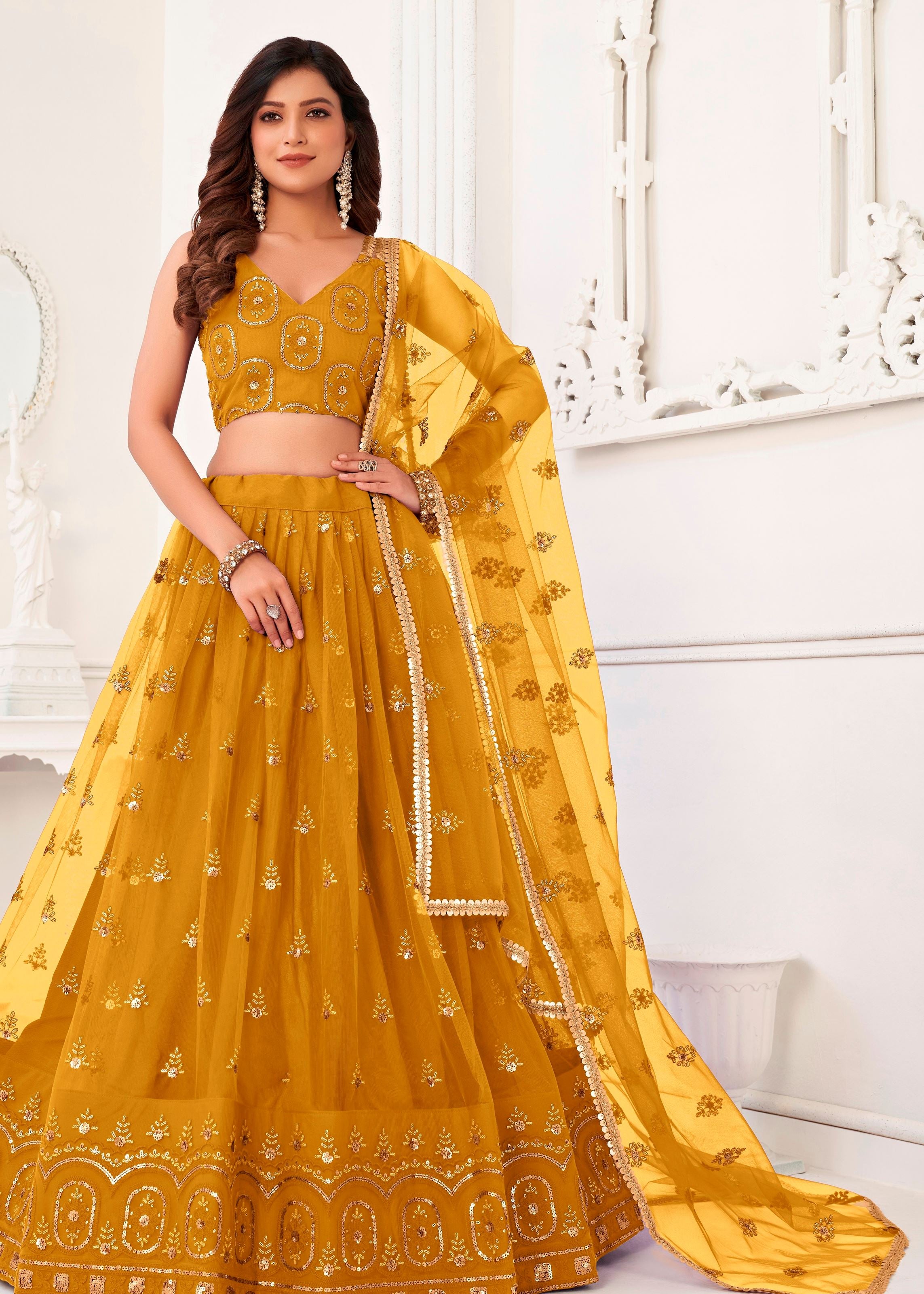 Mustard Butterfly Net Lehenga Choli With  Thread And Zari Sandwich Sequence Embroidery Work