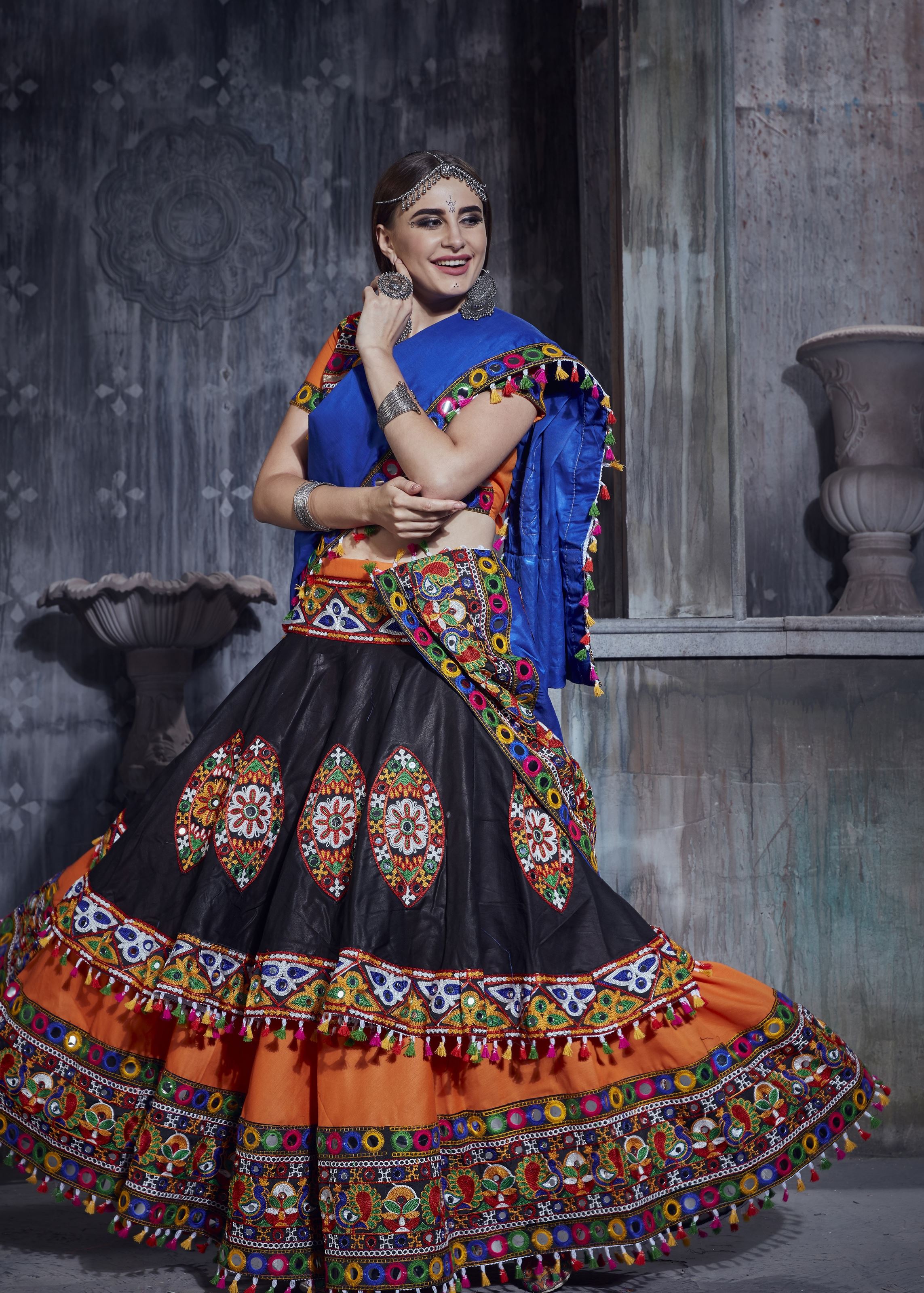 Orange And Black Navratri Chaniya Choli With Gamthi Work And Lace Work With Mirror