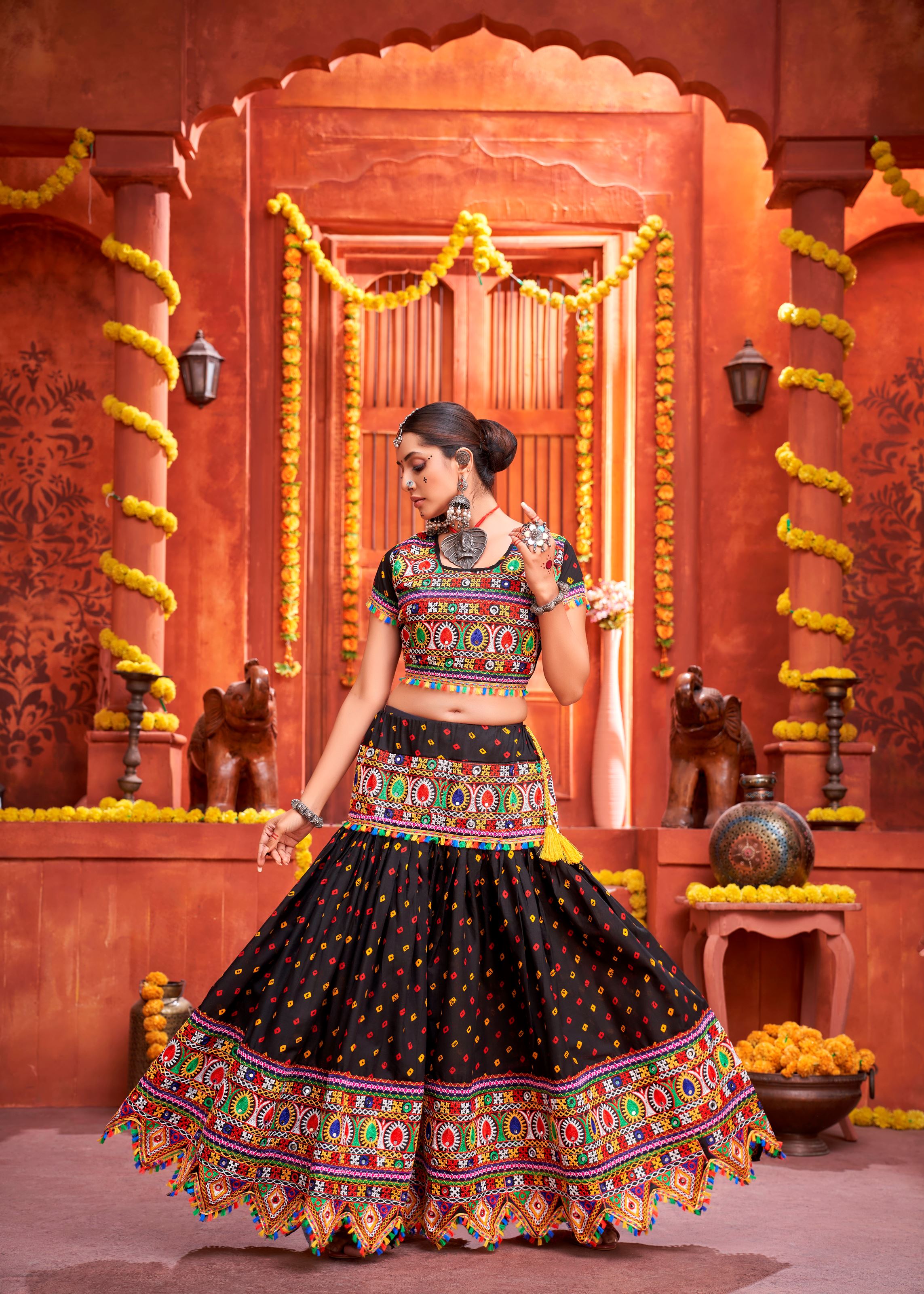 Black And Yellow Navratri Chaniya Choli With Bandhani Print With Gamthi Work And Real Mirror Work