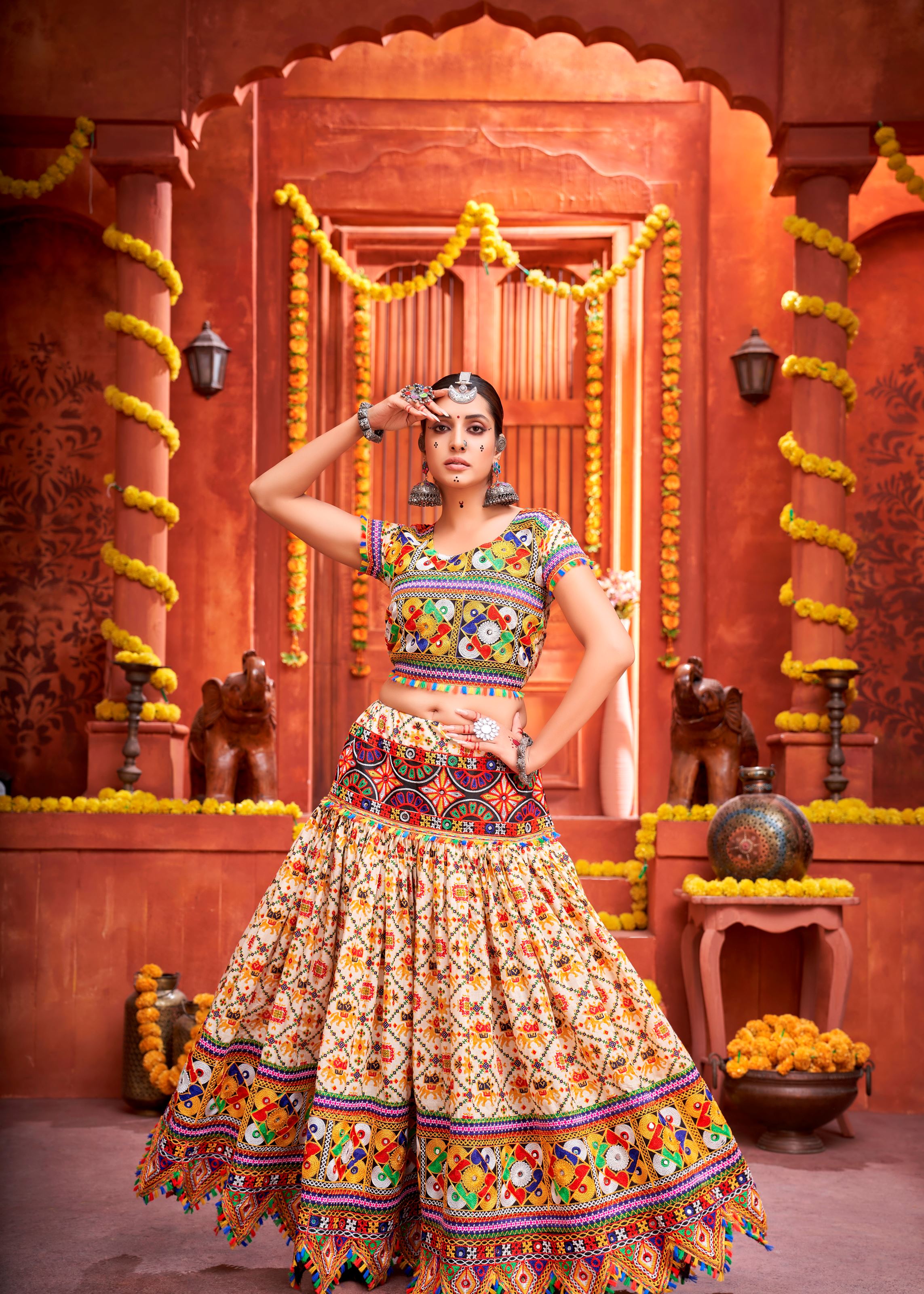 Cream And Pink Navratri Chaniya Choli With Gamthi Work And Pattola Print With Mirror Work