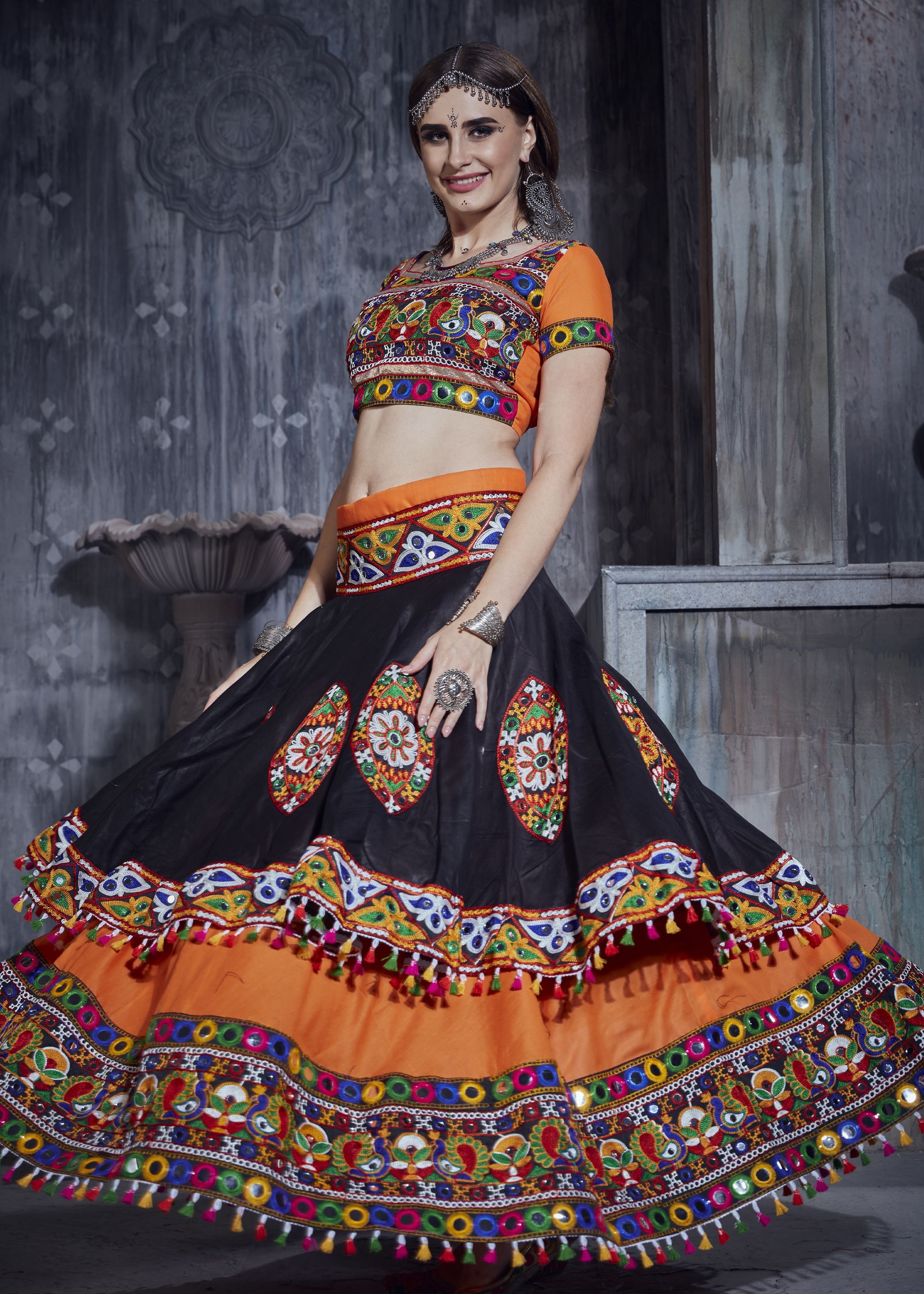 Orange And Black Navratri Chaniya Choli With Gamthi Work And Lace Work With Mirror