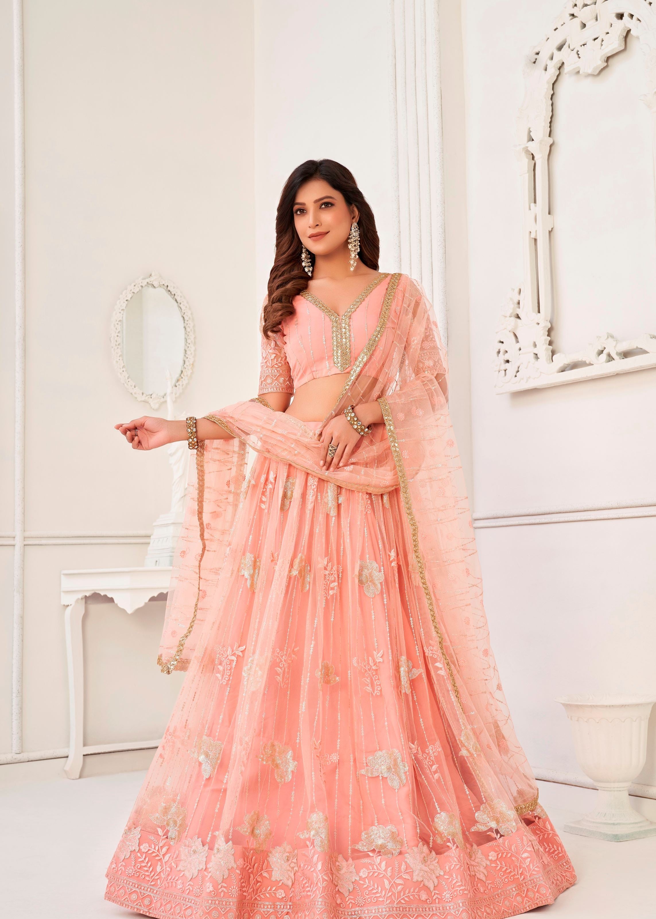 Peach Butterfly Net Lehenga Choli With Tone To Tone Thread Embroidery And Sequins Work