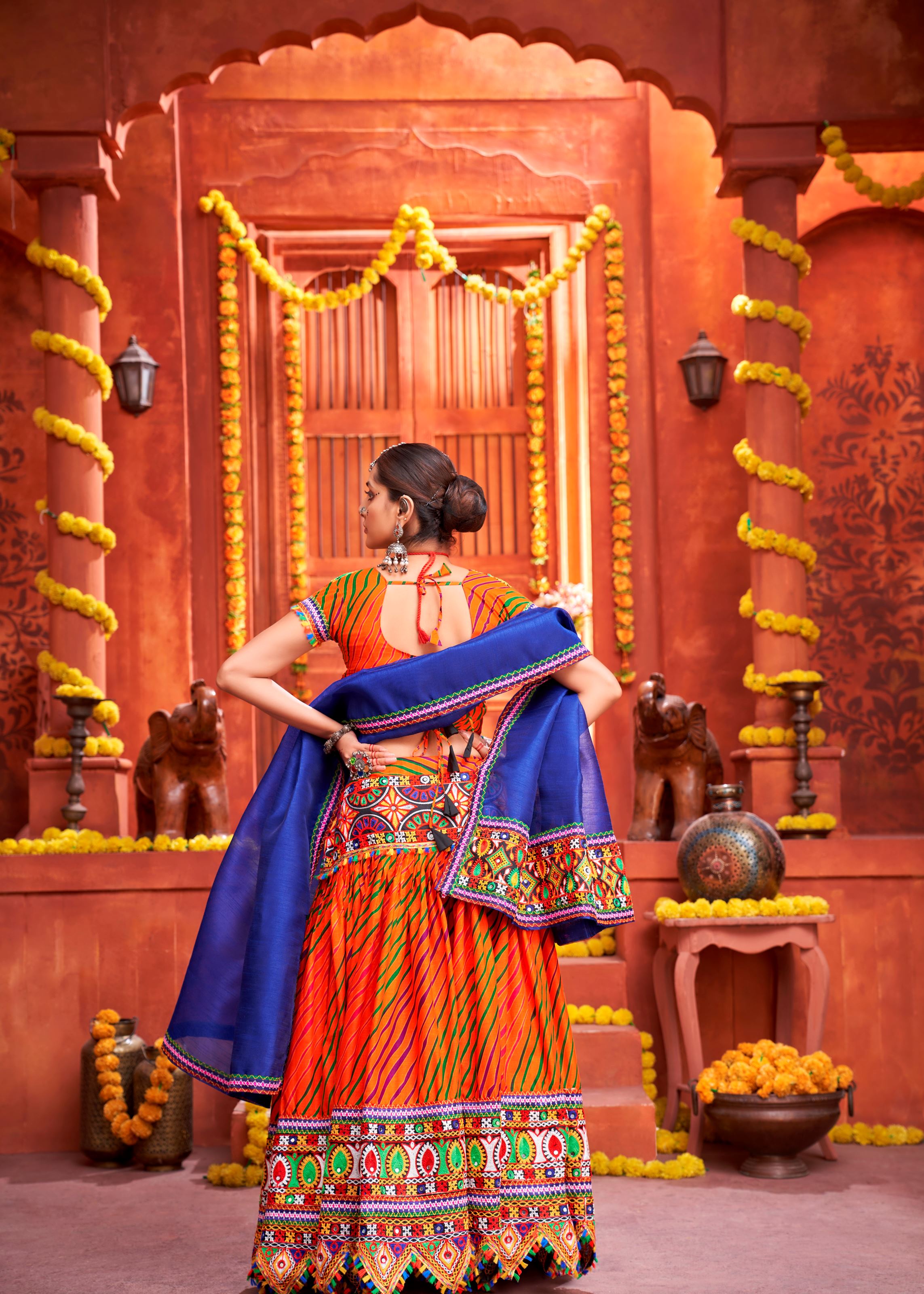Orange And Royal Blue Navratri Chaniya Choli With Laheriya Print With Gamthi Work And Real Mirror  Work