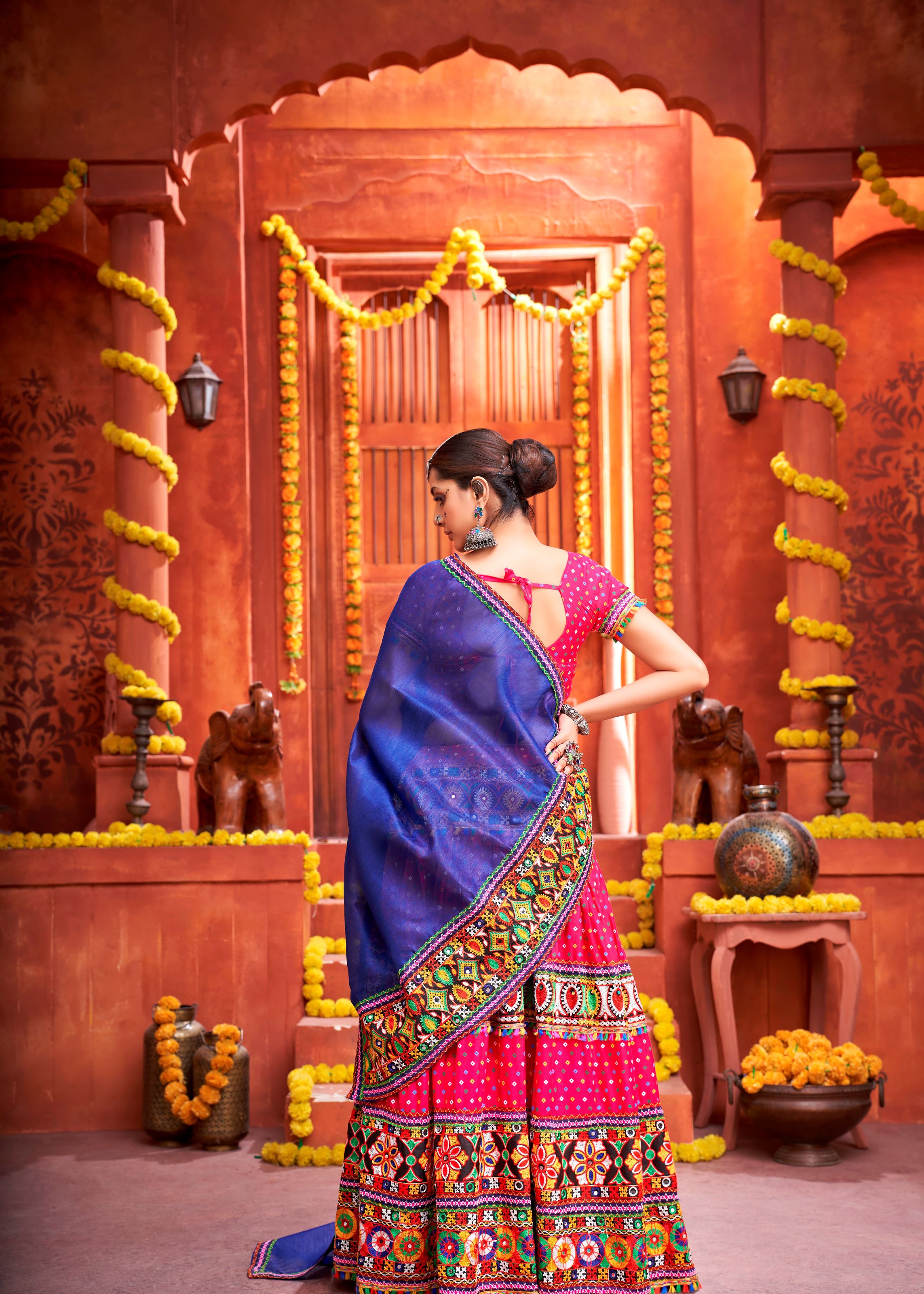Pink And Royal Blue Navratri Chaniya Choli With Bandej Print With Gamthi Work And Real Mirror Work
