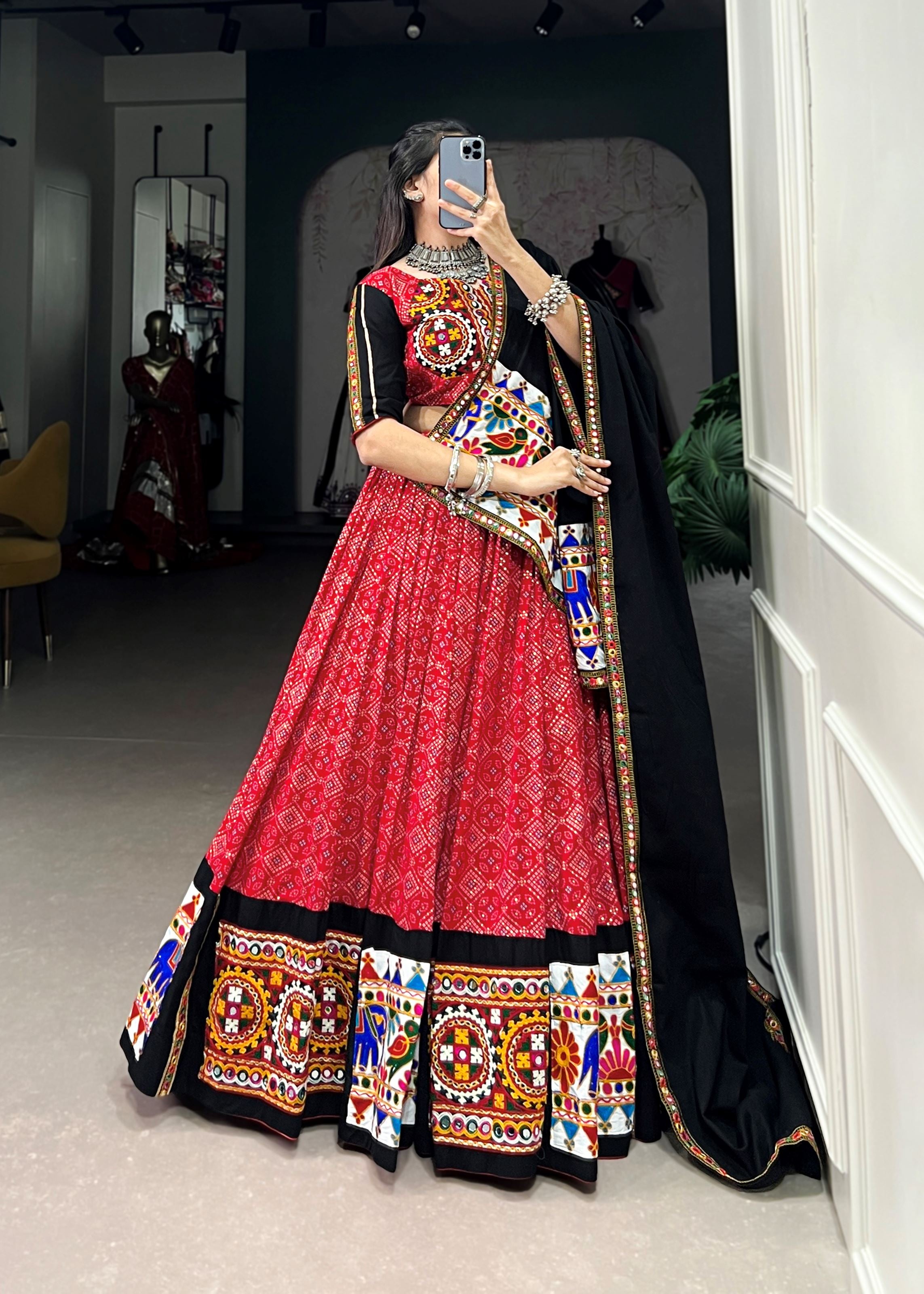 Red Where Tradition Meets Trend: Printed Pure Cotton Lehenga Cholis with Gamthi & Mirror Work"