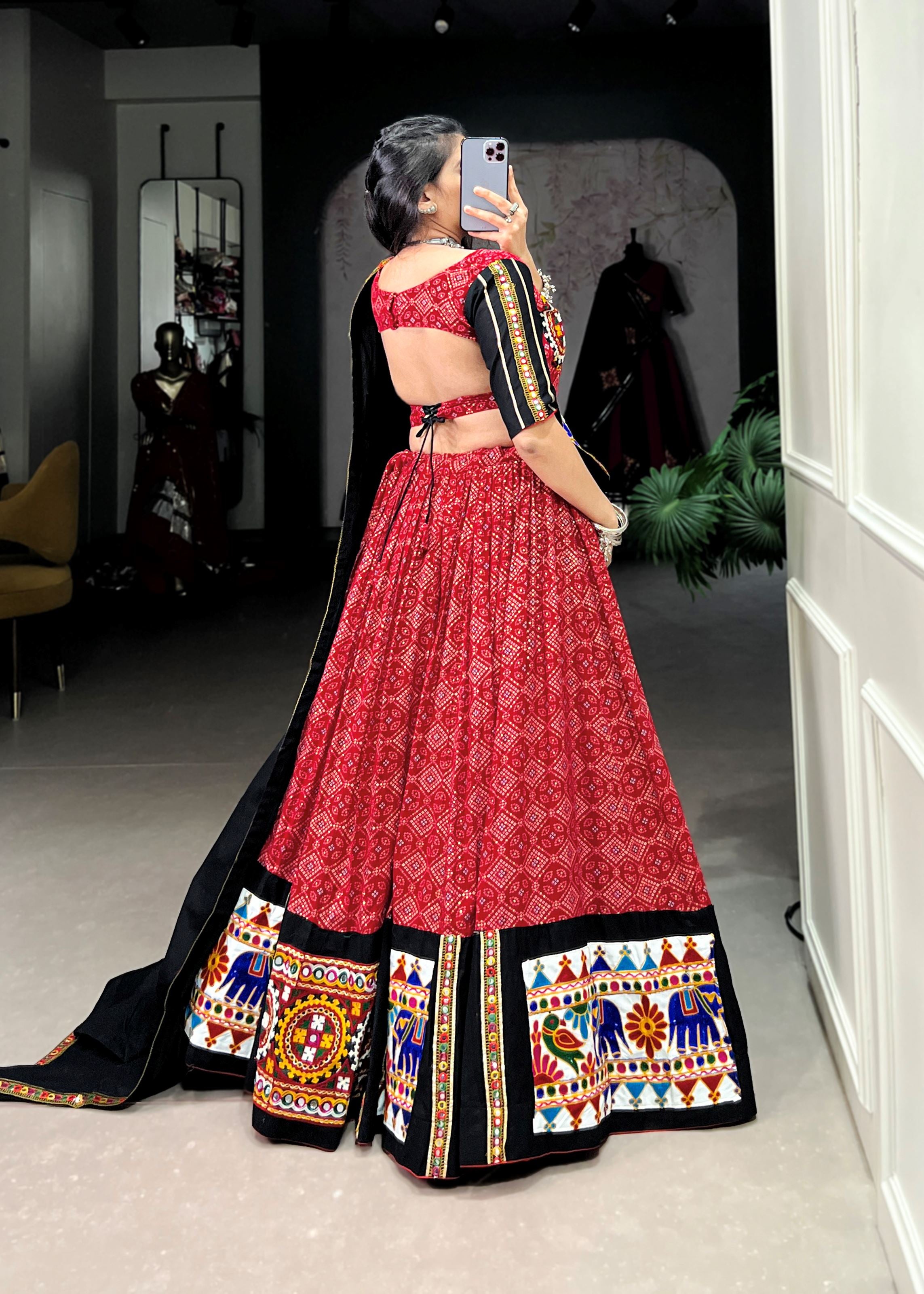 Red Where Tradition Meets Trend: Printed Pure Cotton Lehenga Cholis with Gamthi & Mirror Work"