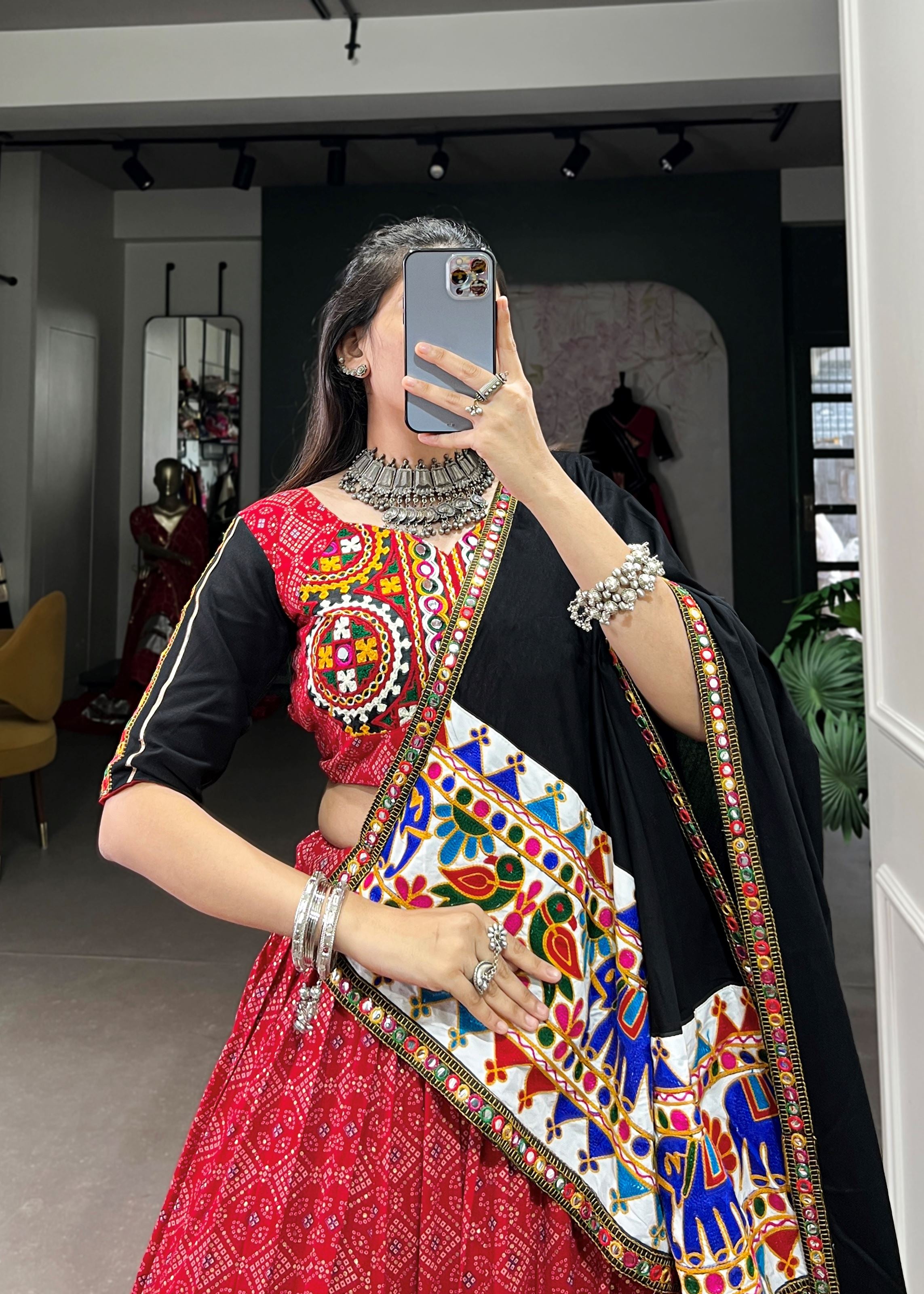 Red Where Tradition Meets Trend: Printed Pure Cotton Lehenga Cholis with Gamthi & Mirror Work"