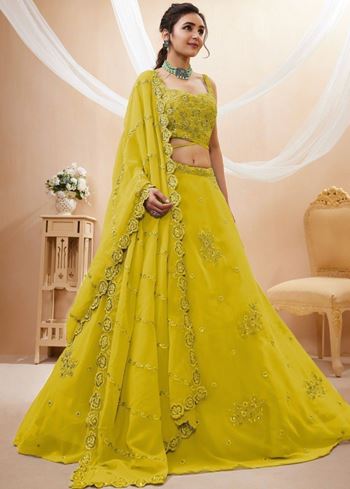 Adorable Neon Yellow Sequins Georgette Wedding Wear Lehenga Choli