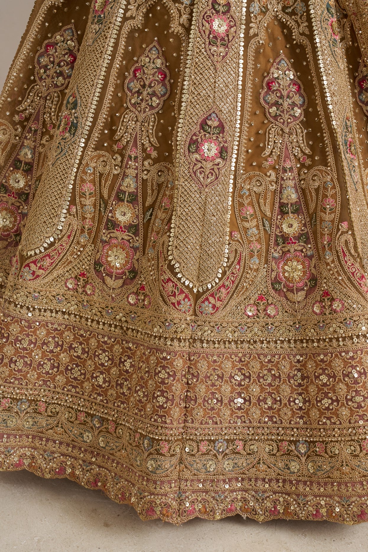 Antique Gold Net Royal Bridal Lehenga Choli with Designer Embellishments