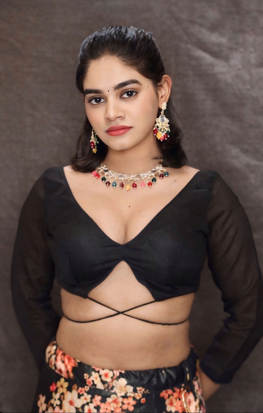 Black Blouse With Plunging V Neckline