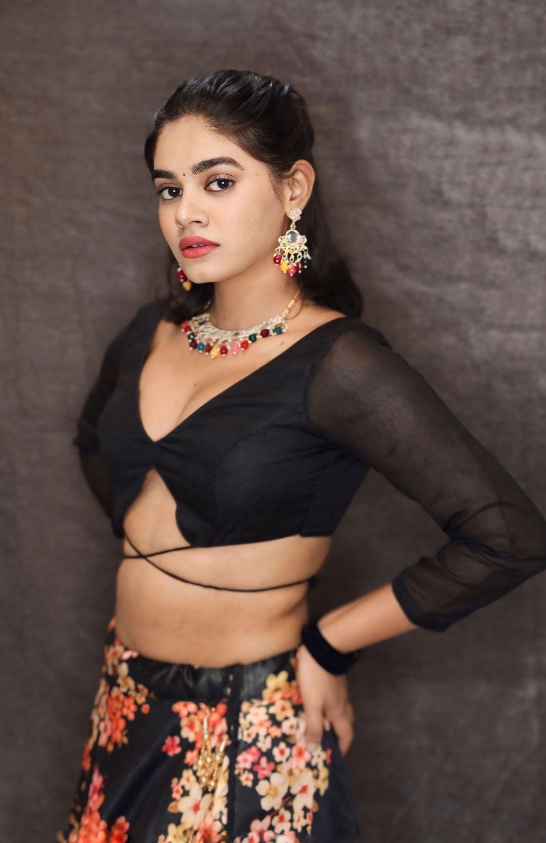 Black Blouse With Plunging V Neckline