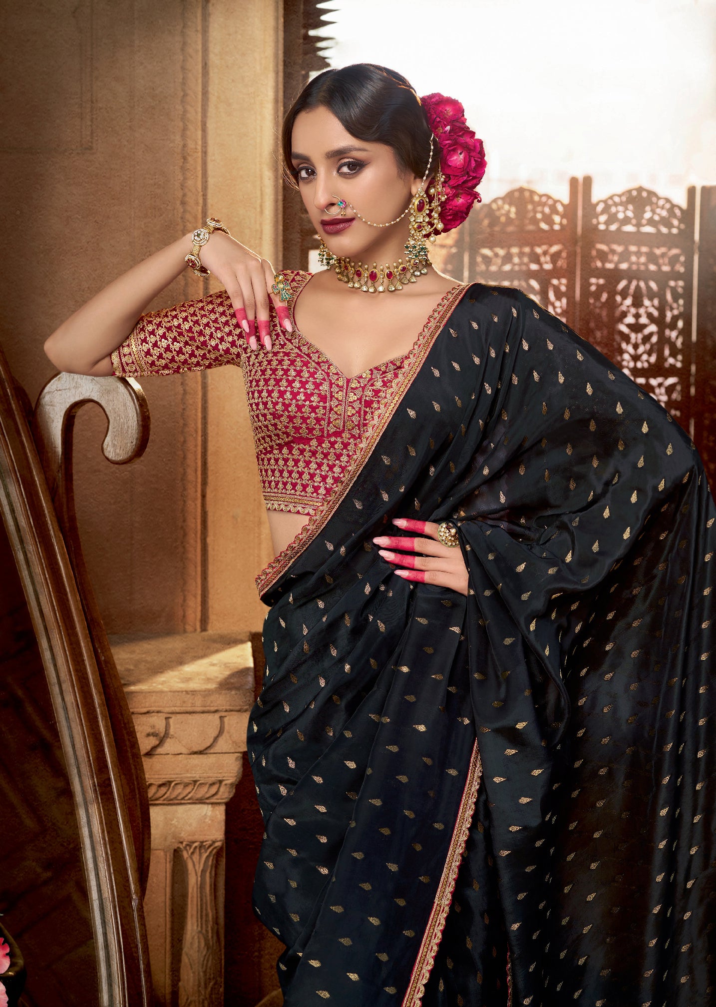 Black Viscose Crepe Saree with Butti Weaving and Embroidered Blouse