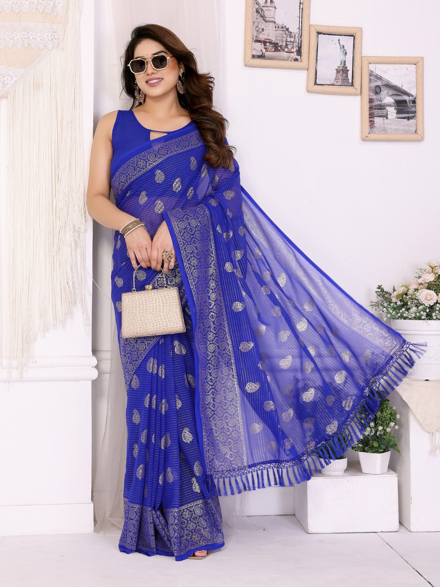 Blue Georgette Saree With Foil Work And Designer Lace Border