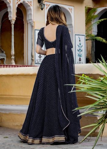 Captivating Black Laheriya Print Georgette Wedding Lehenga Choli