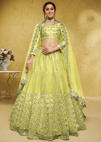Captivating Lime Yellow Foil Work Net Engagement Wear Lehenga Choli