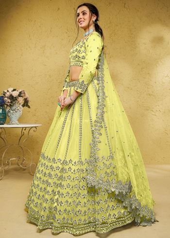 Captivating Lime Yellow Foil Work Net Engagement Wear Lehenga Choli