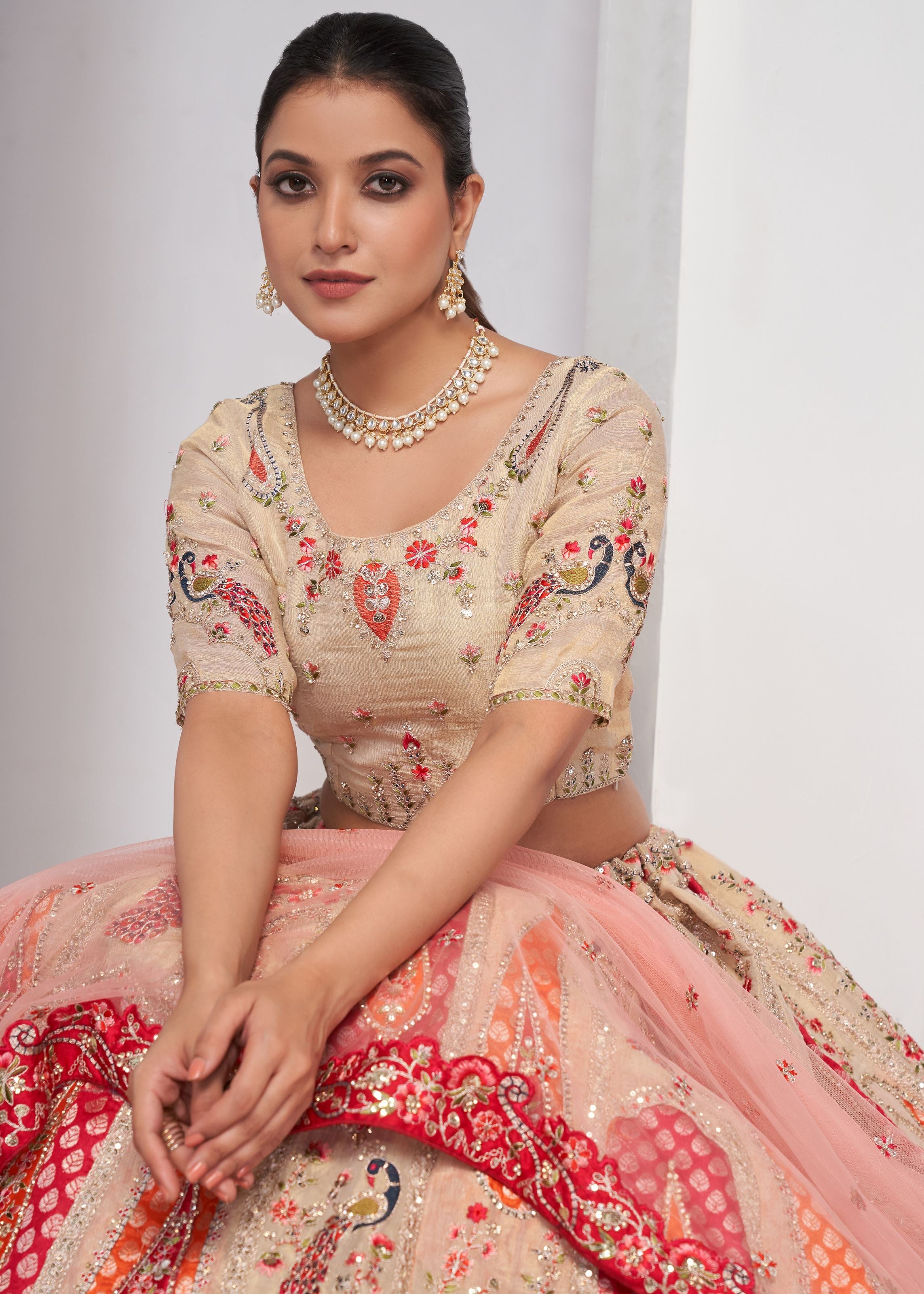 Chiku Banarasi Silk Lehenga Choli With Paisely Motifs Beautiful Peacock Embroidered In Bright Cream Colour