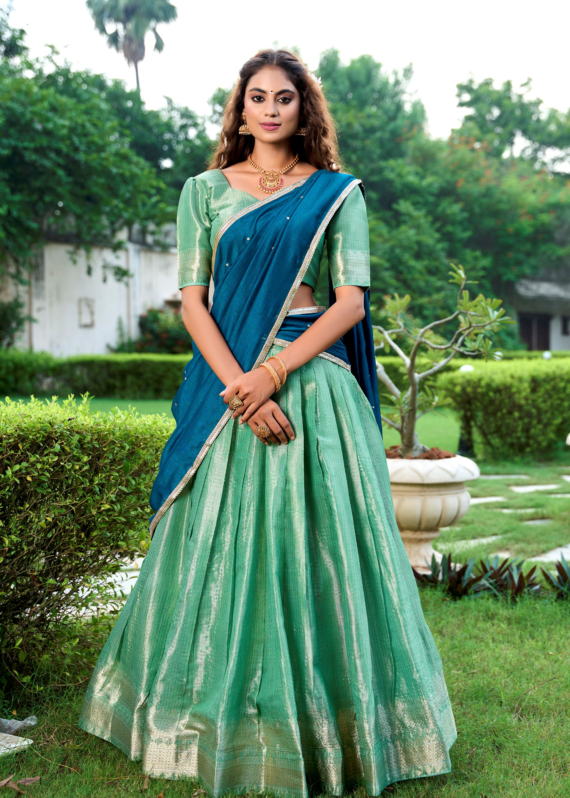 Classic Pista Elegance With A Touch Of Tradition  Kanchipuram Lehenga