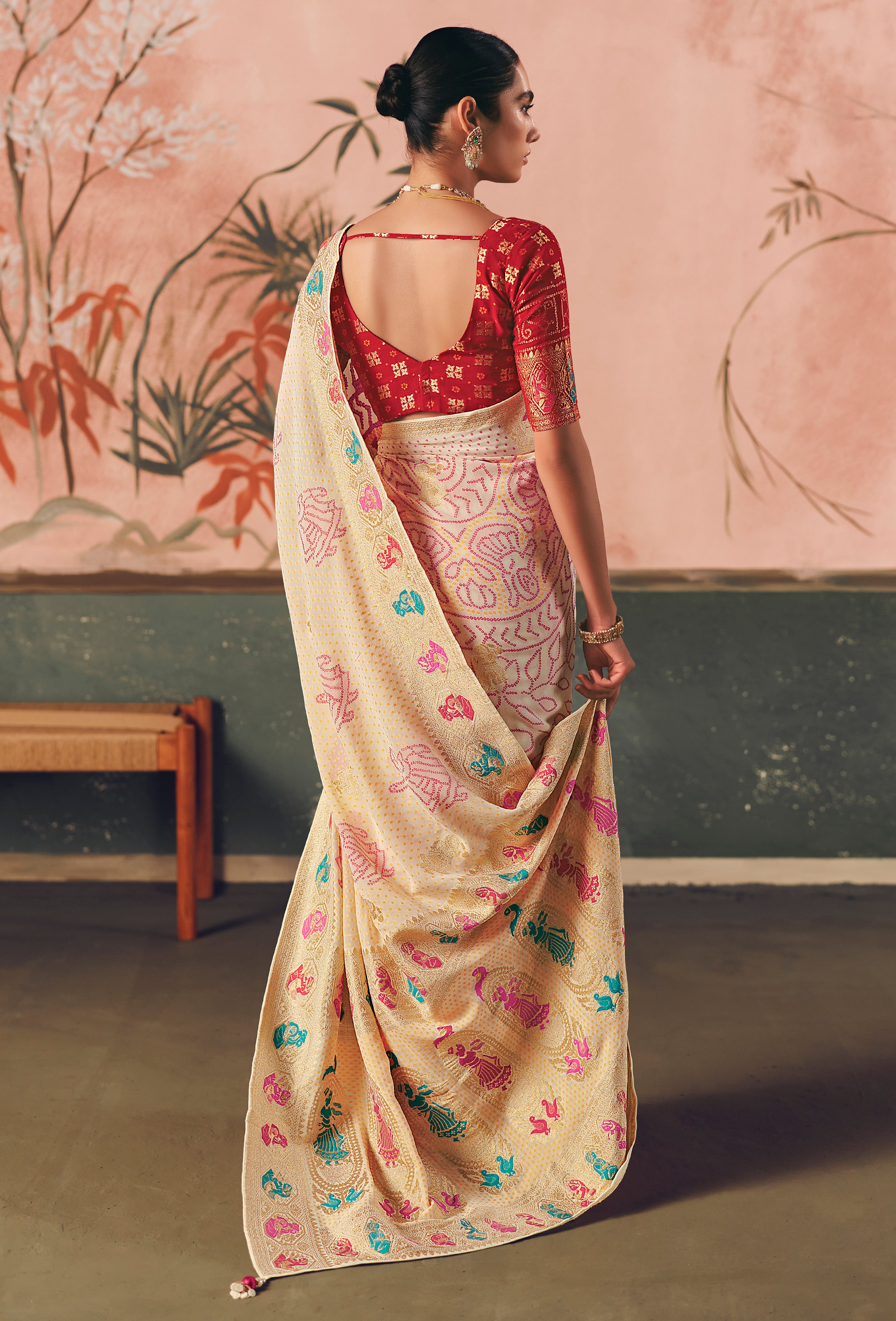 Cream Saree With  Designer Bandhej Weaving Work With Beutifull Tassles Attached