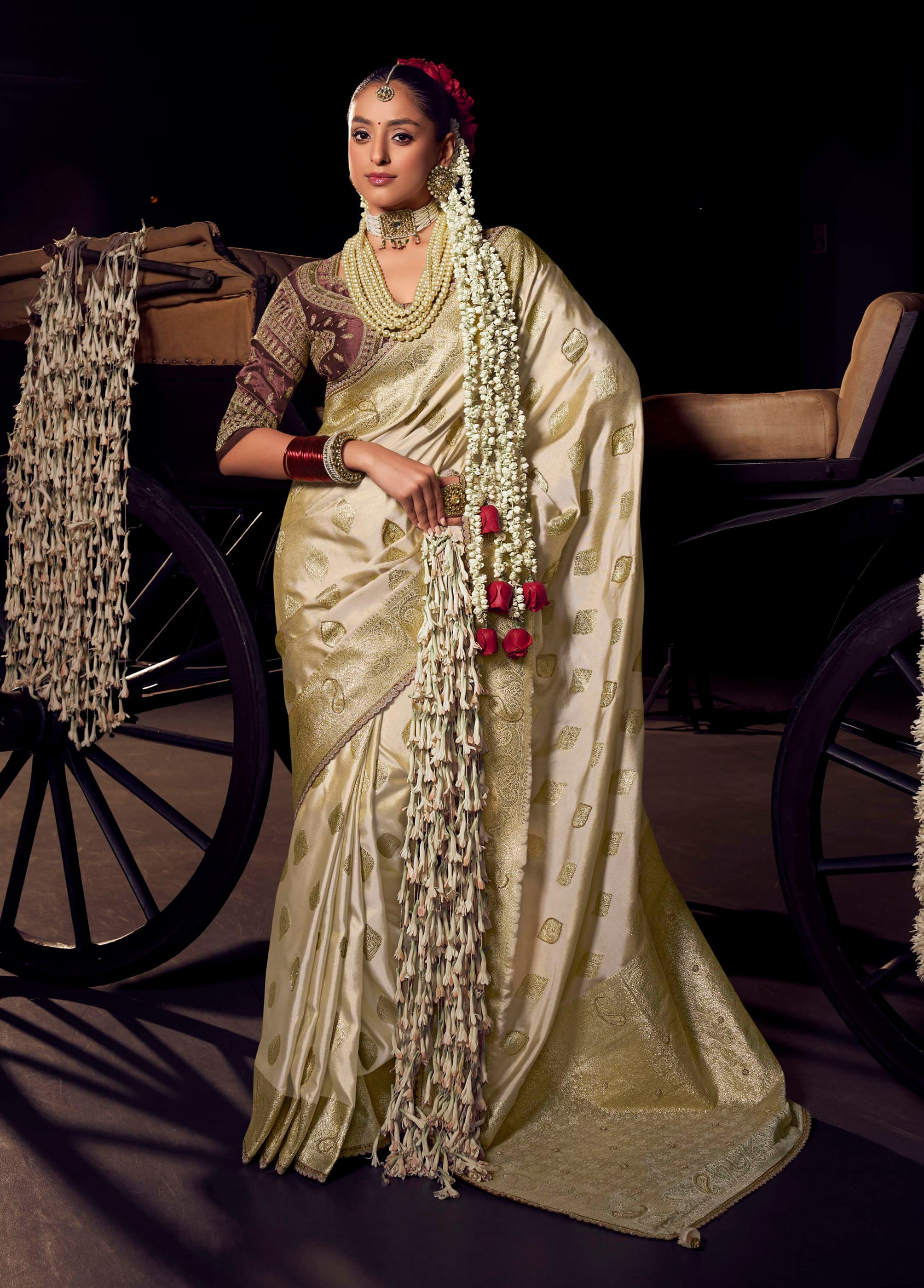 Cream Viscose Tissue Saree with Hand Work and Embroidered Blouse