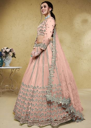 Fascinating Dusty Pink Foil Work Net Bridesmaid Lehenga Choli