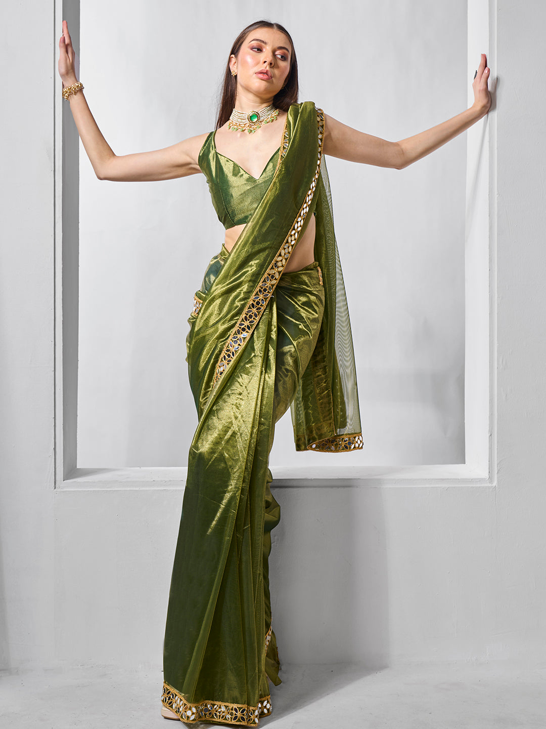 Green Gold Tissue Net Solid Texture Saree With Graceful Gold Cotted