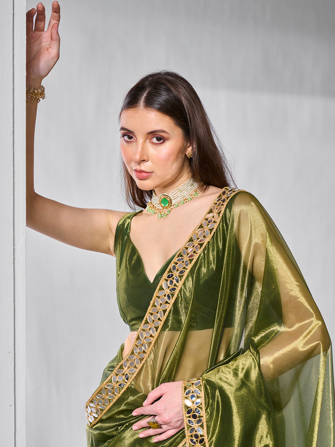 Green Gold Tissue Net Solid Texture Saree With Graceful Gold Cotted