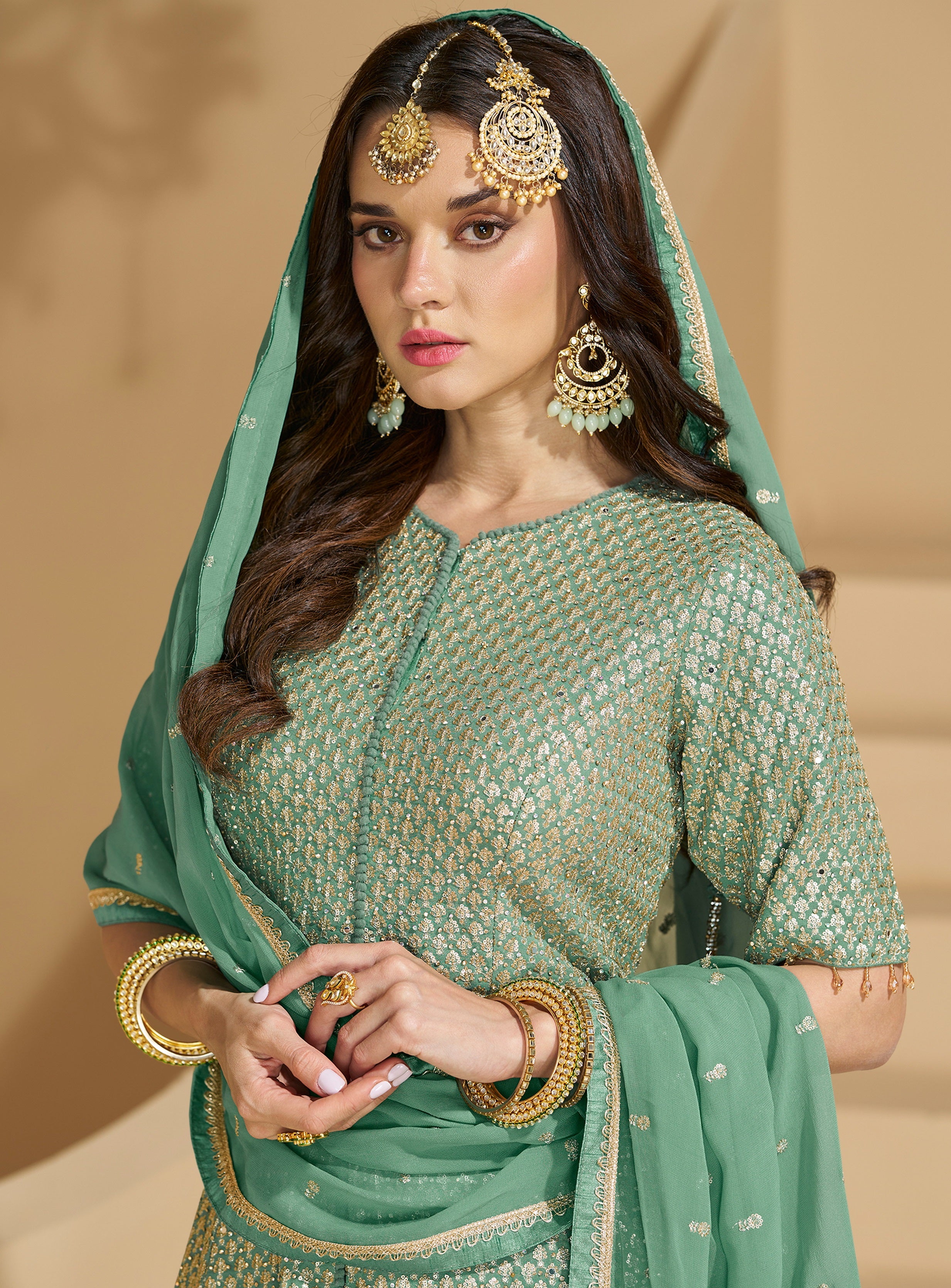 Green Heavy Designer Suit With Heavy Embroidery Work