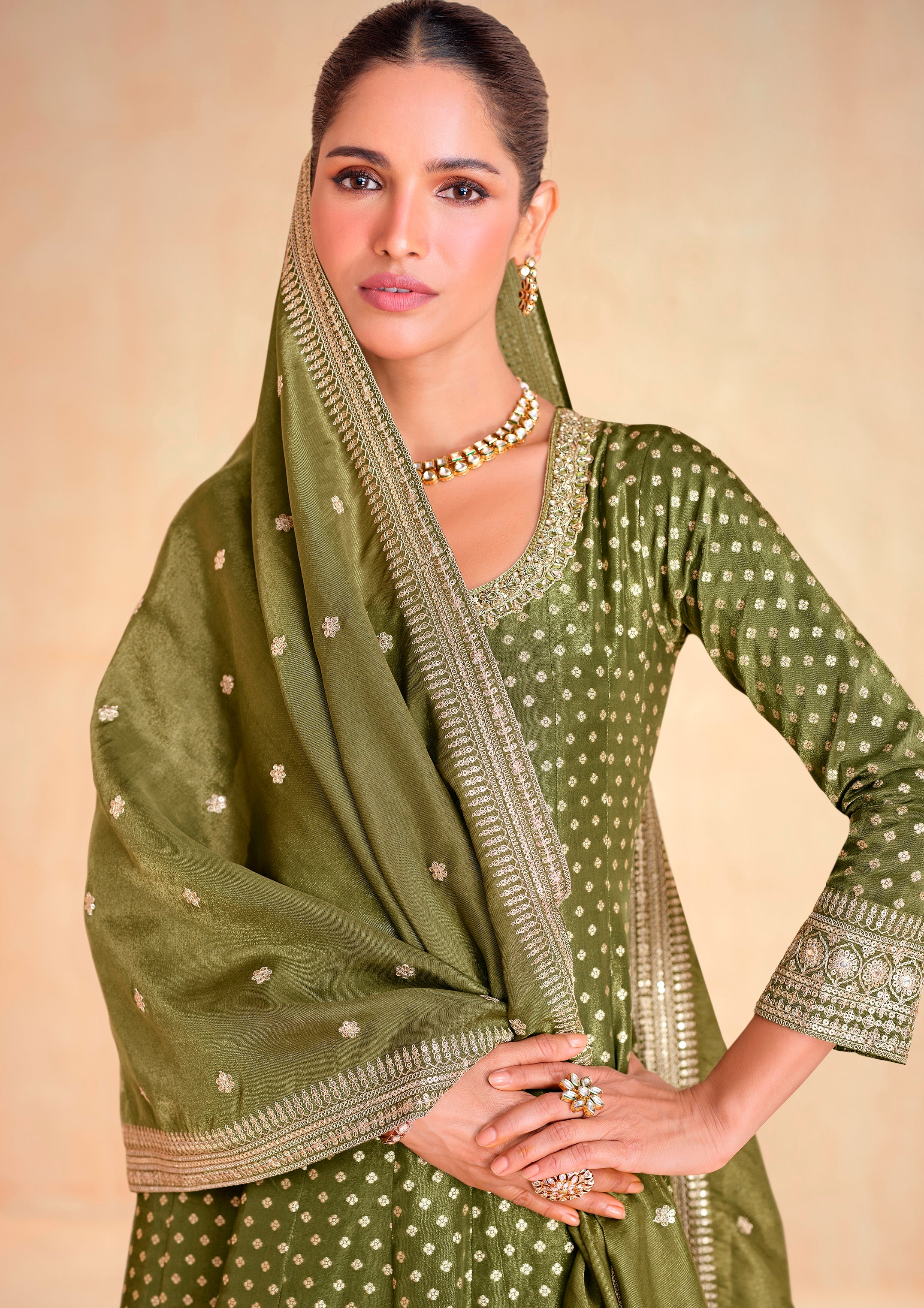 Green Heavy Designer Suit With Heavy Embroidery Work
