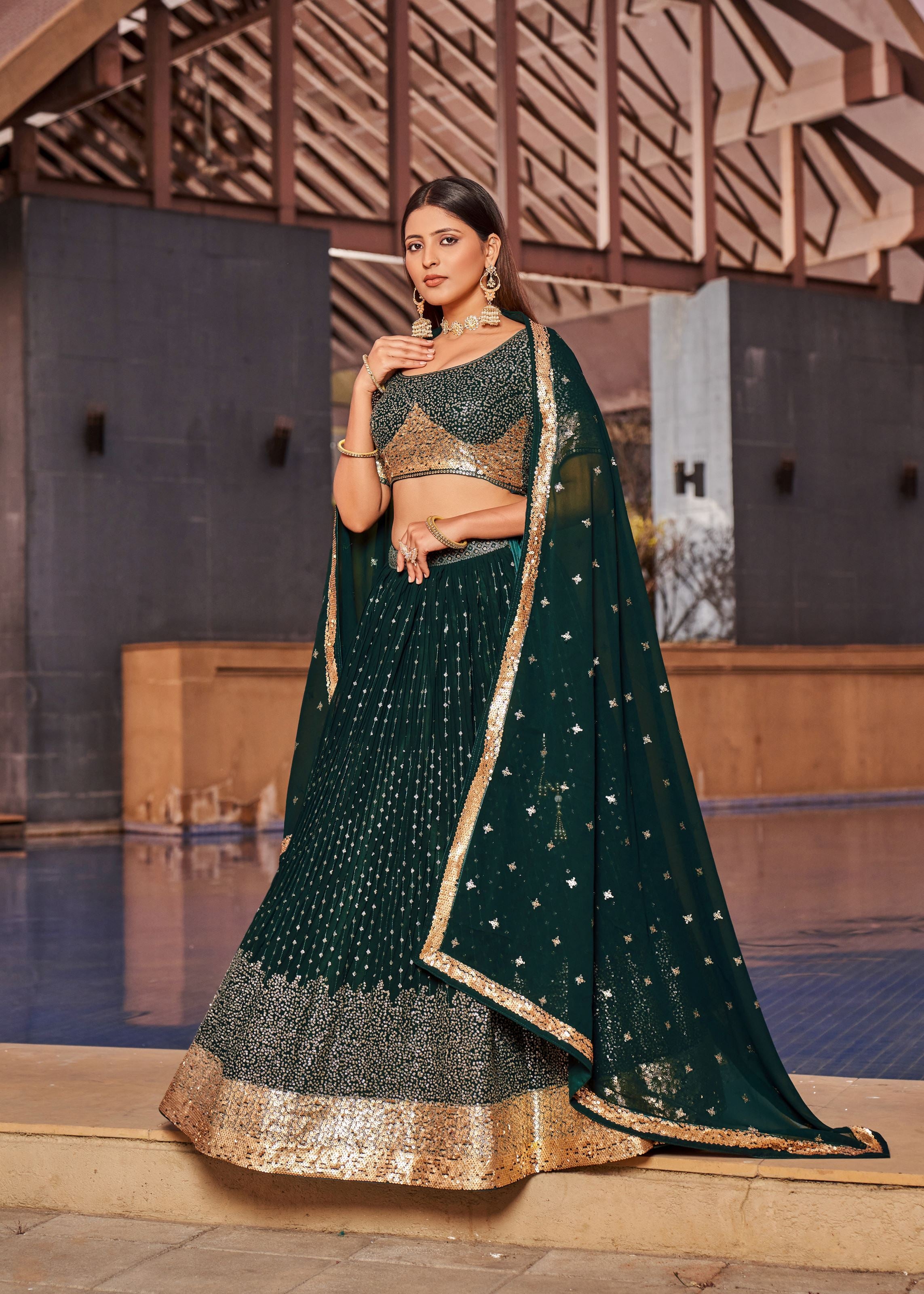 Green Lehenga Choli With Multiple Sequins And Thread Embroidery Work