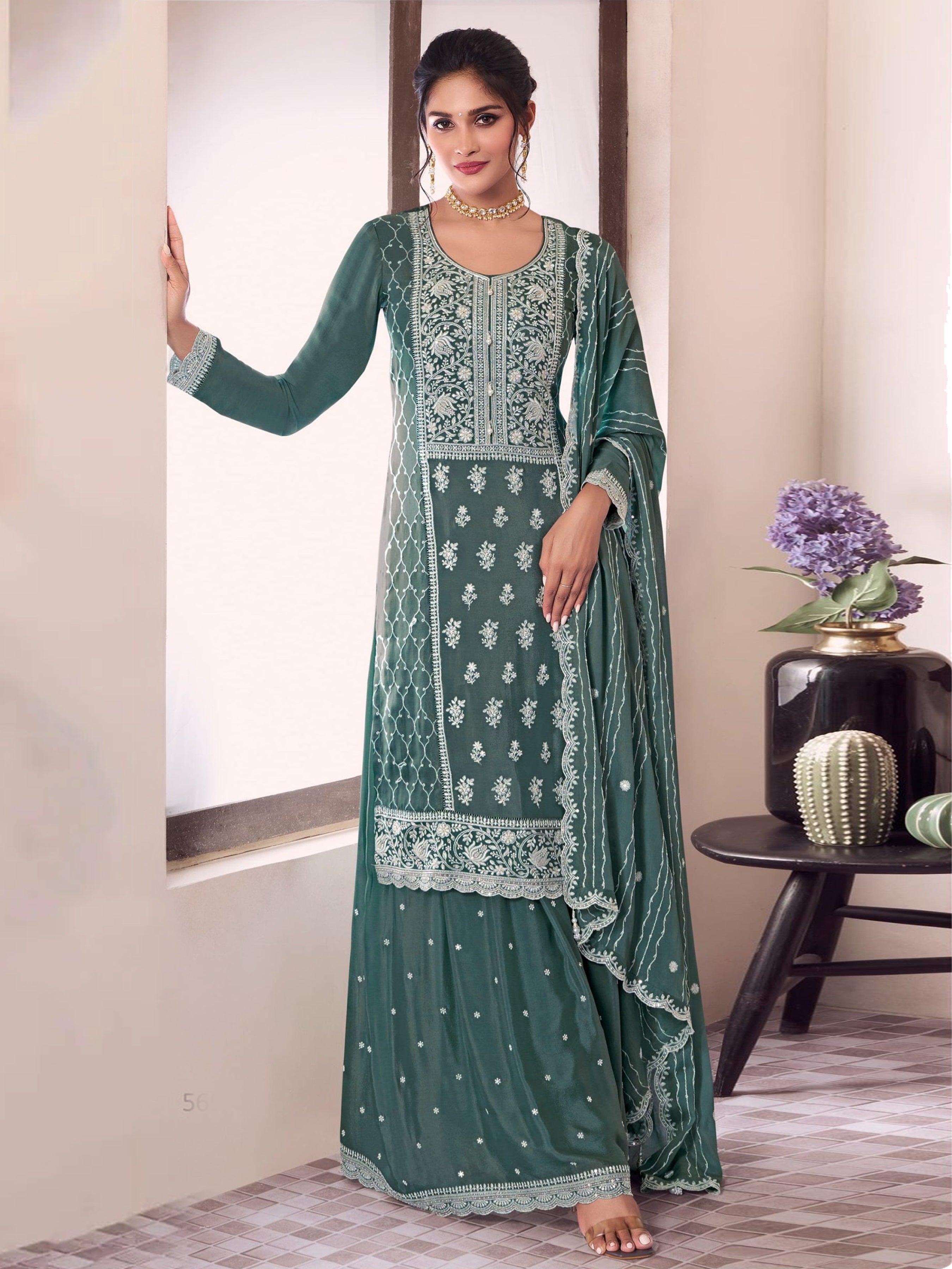 Green Palazzo Style Salwar Suit With Heavy Embroidery Work